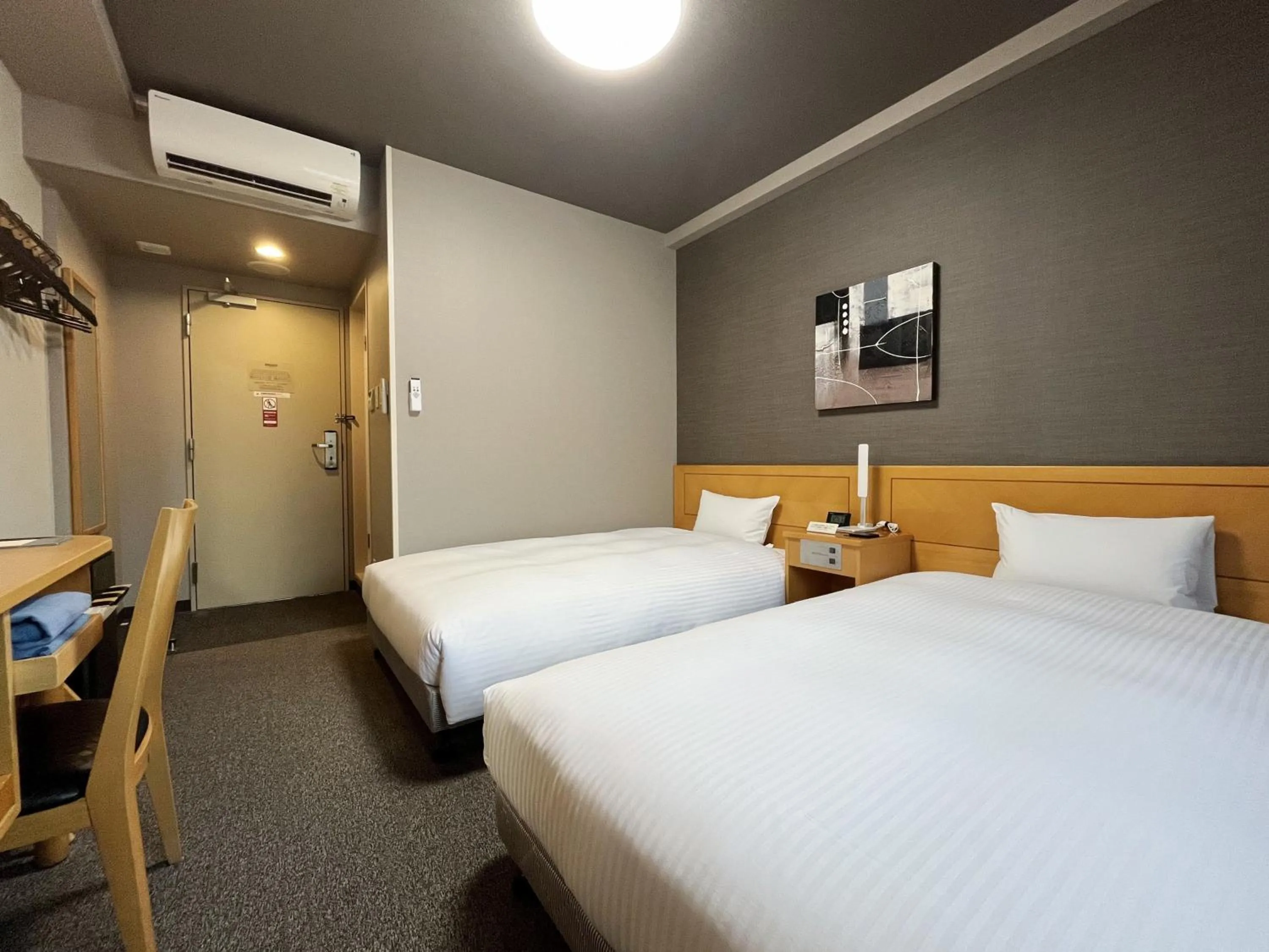 Photo of the whole room, Bed in Hotel Route-Inn Morioka Ekimae
