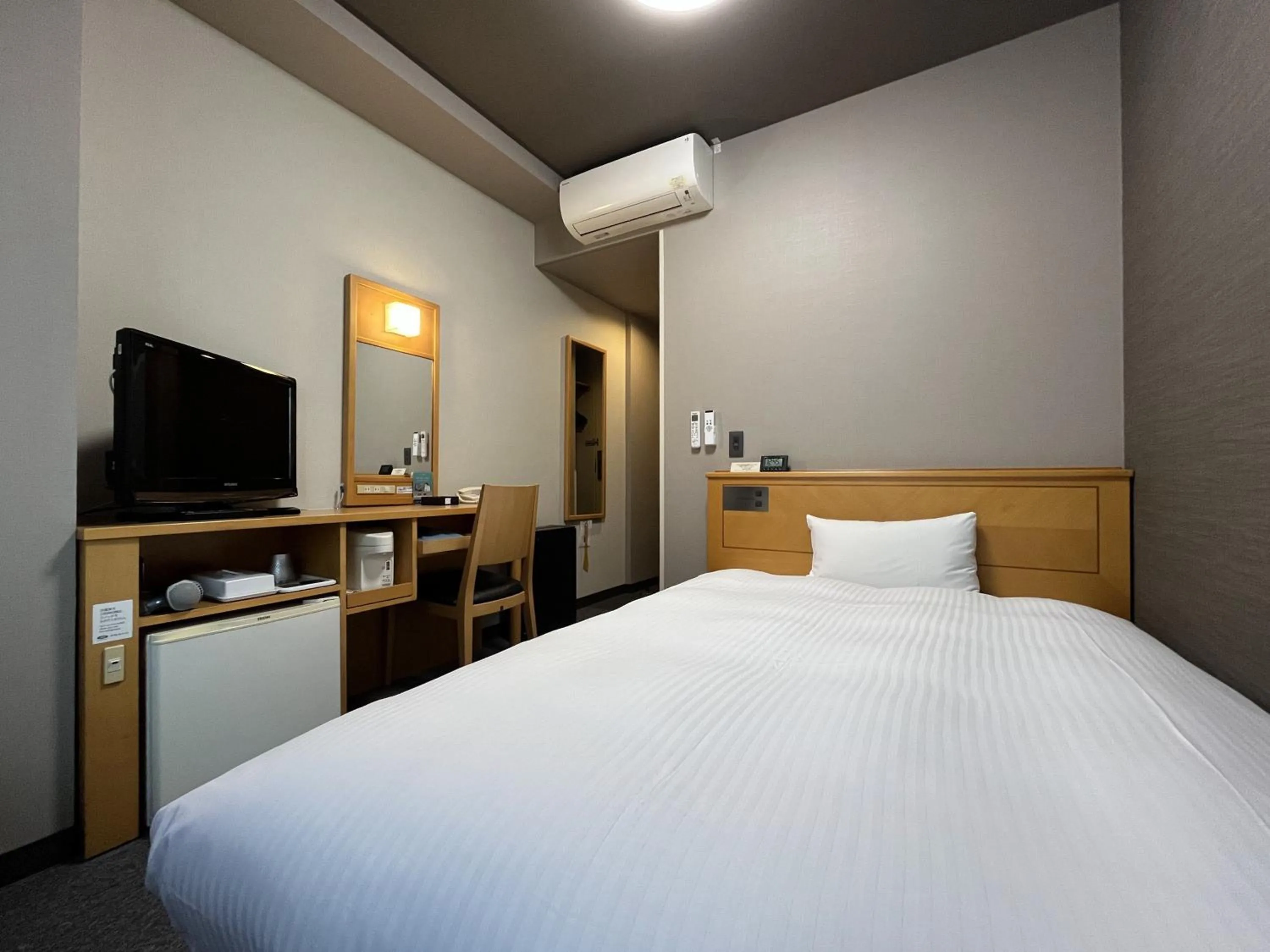Photo of the whole room, Bed in Hotel Route-Inn Morioka Ekimae