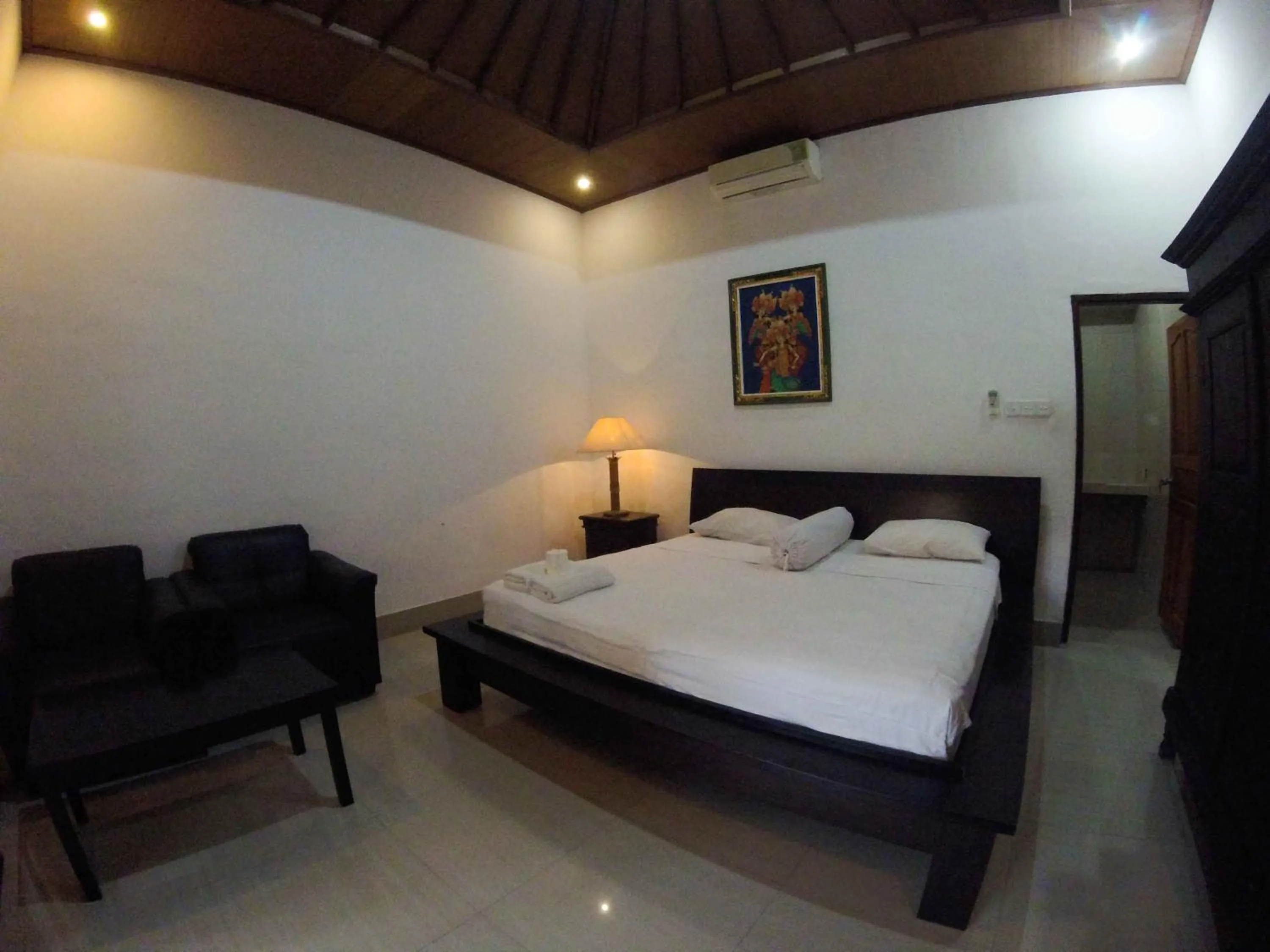 Bed in Putu Guest House