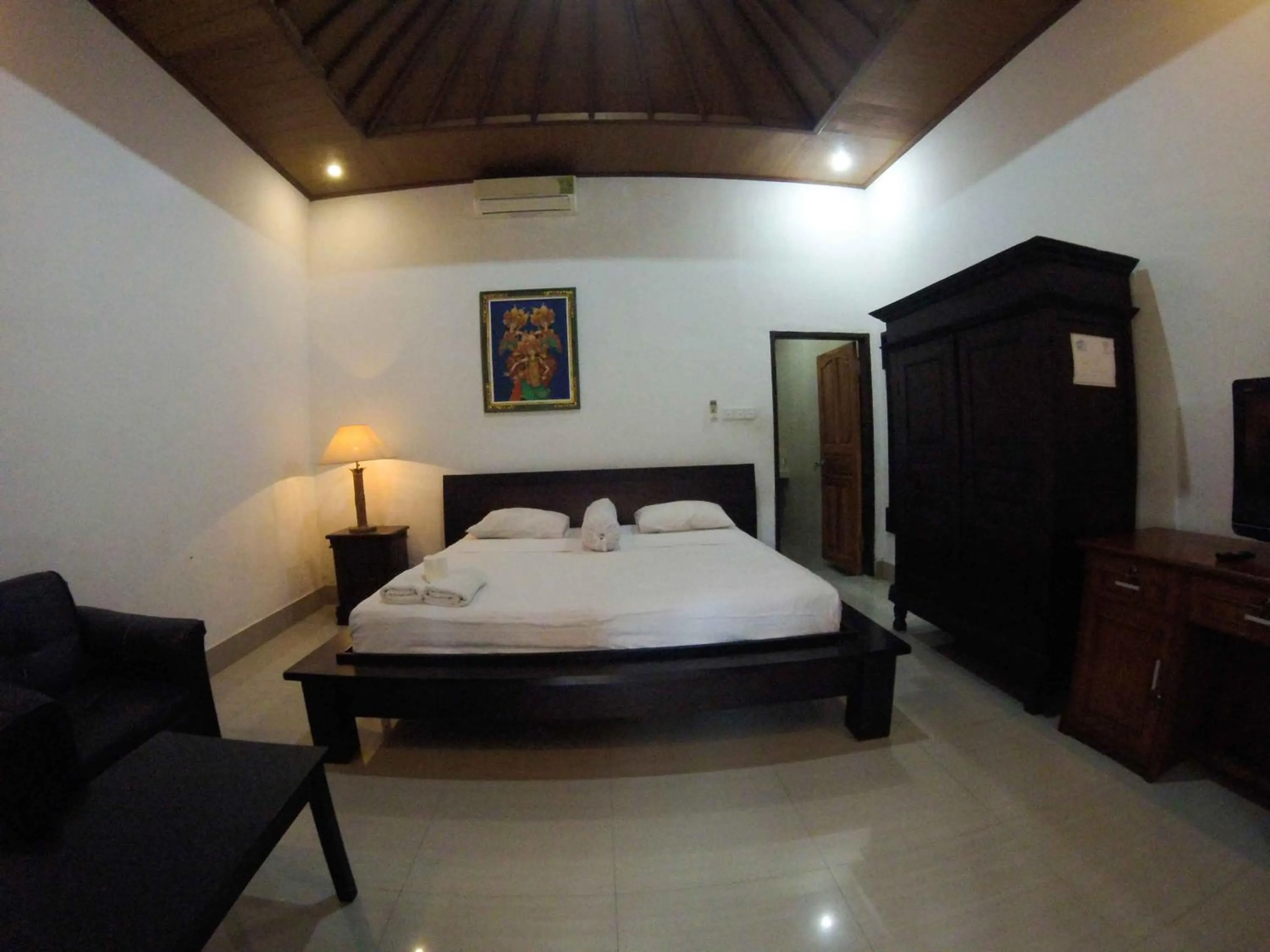 Bed in Putu Guest House