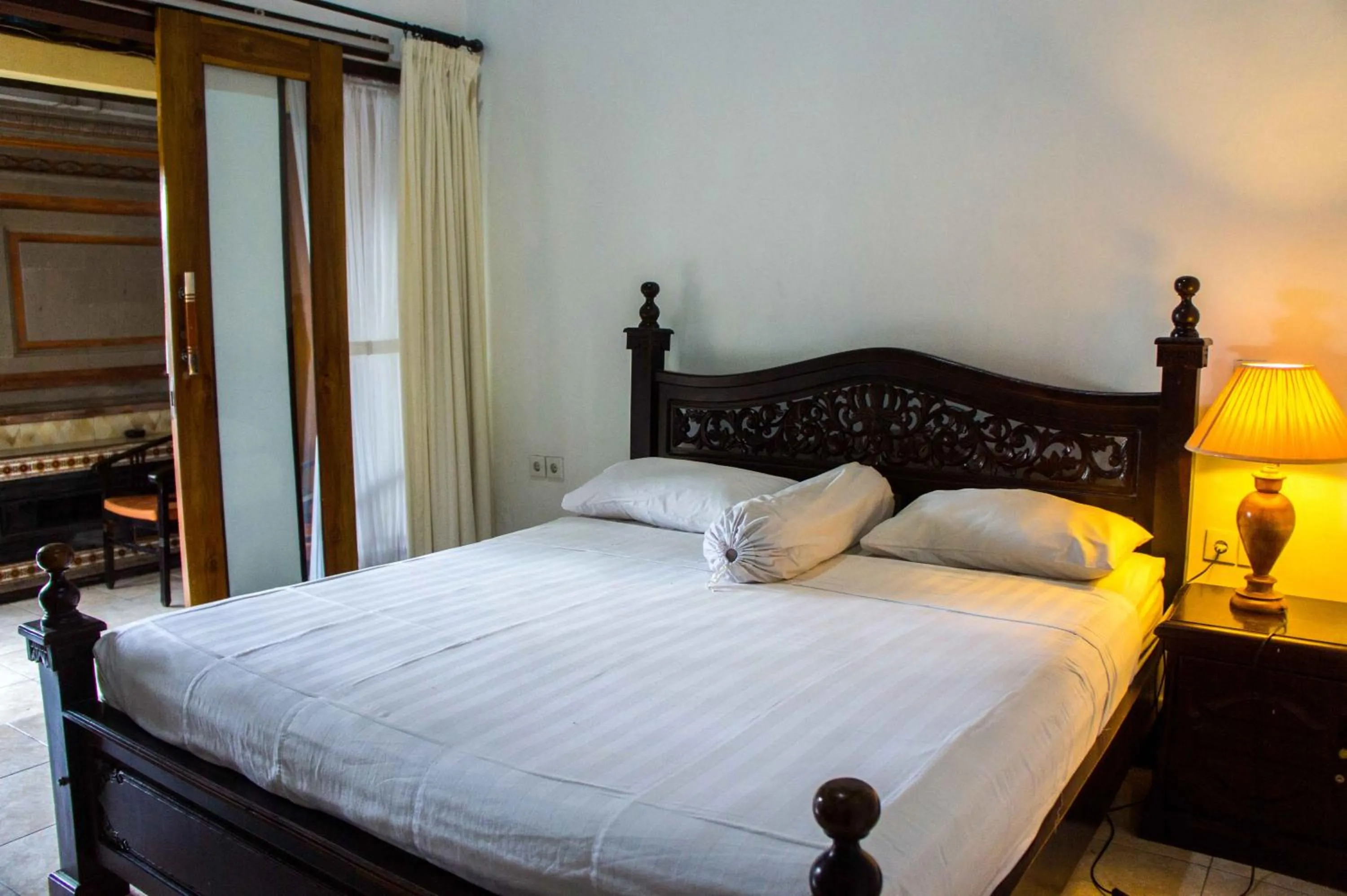 Bed in Putu Guest House