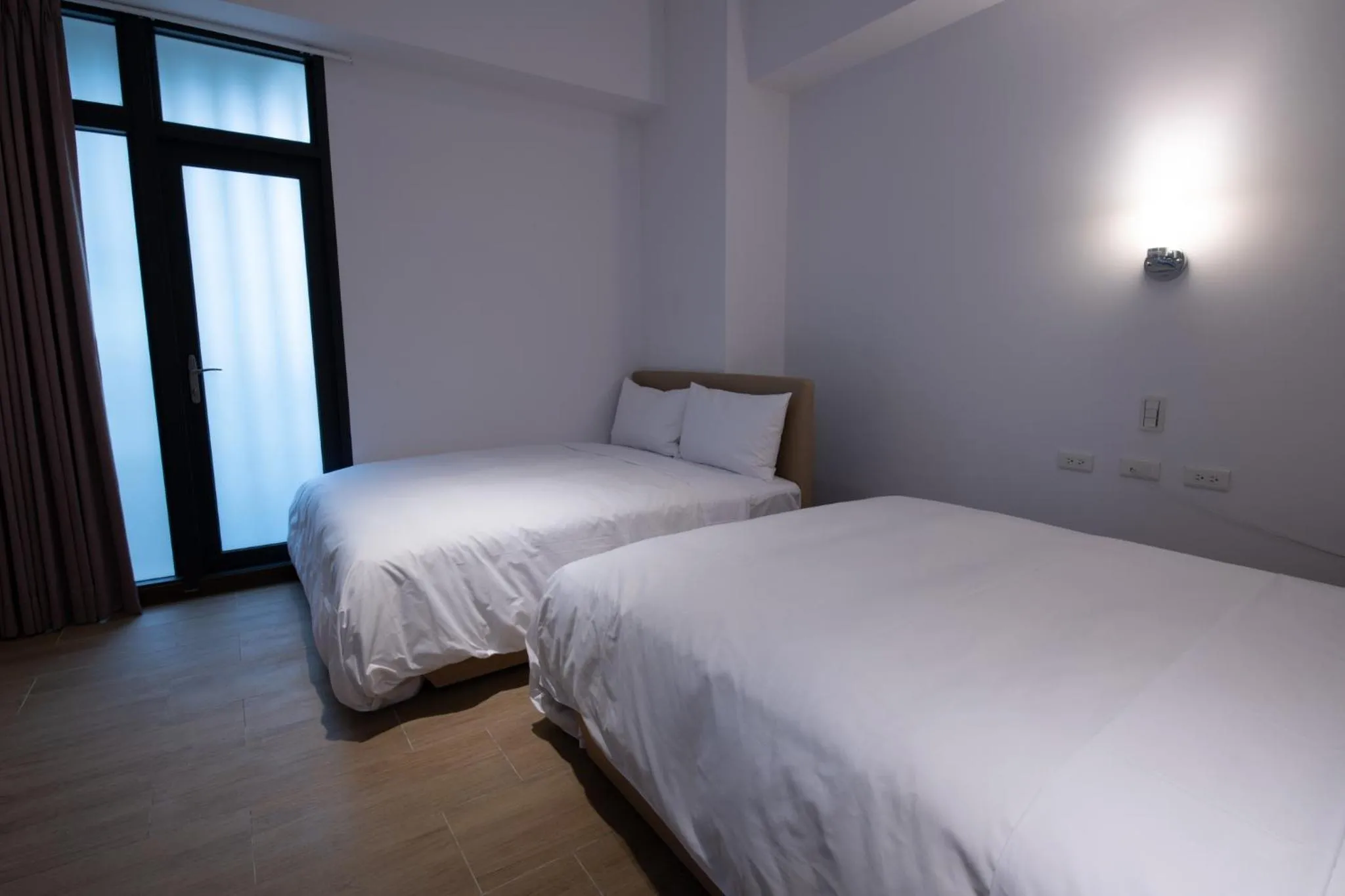 Bed in LIANN Hotel