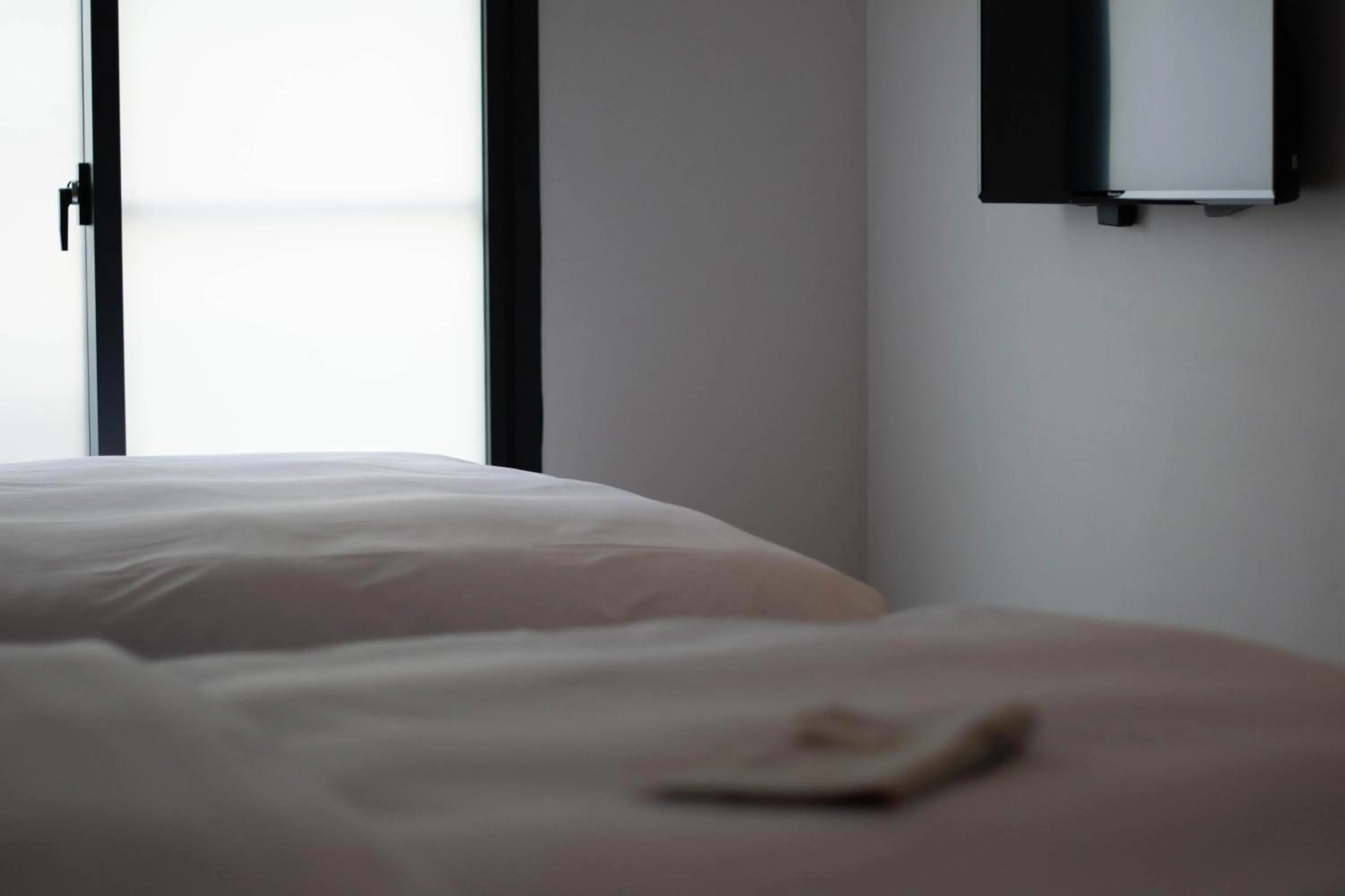 Bed in LIANN Hotel