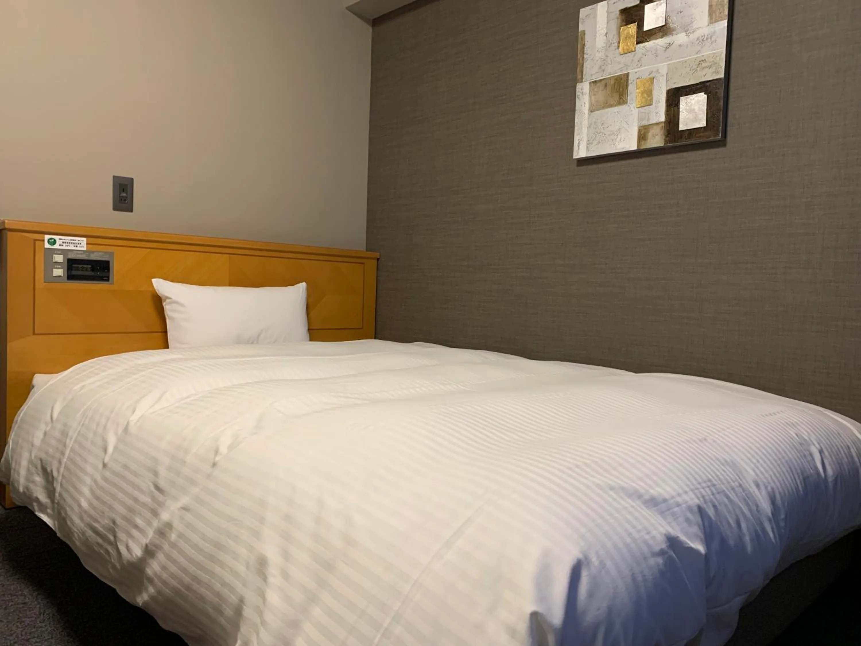 Photo of the whole room, Bed in Hotel Route-Inn Shiojirikita Inter