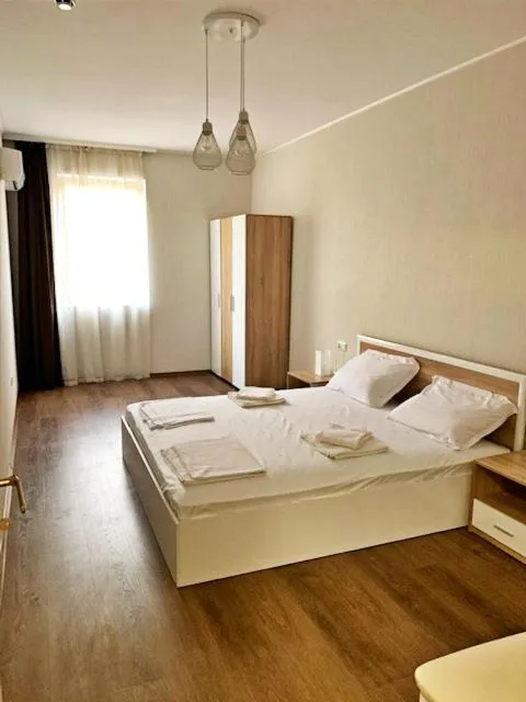 Photo of the whole room, Bed in Golden Rainbow Beach Hotel