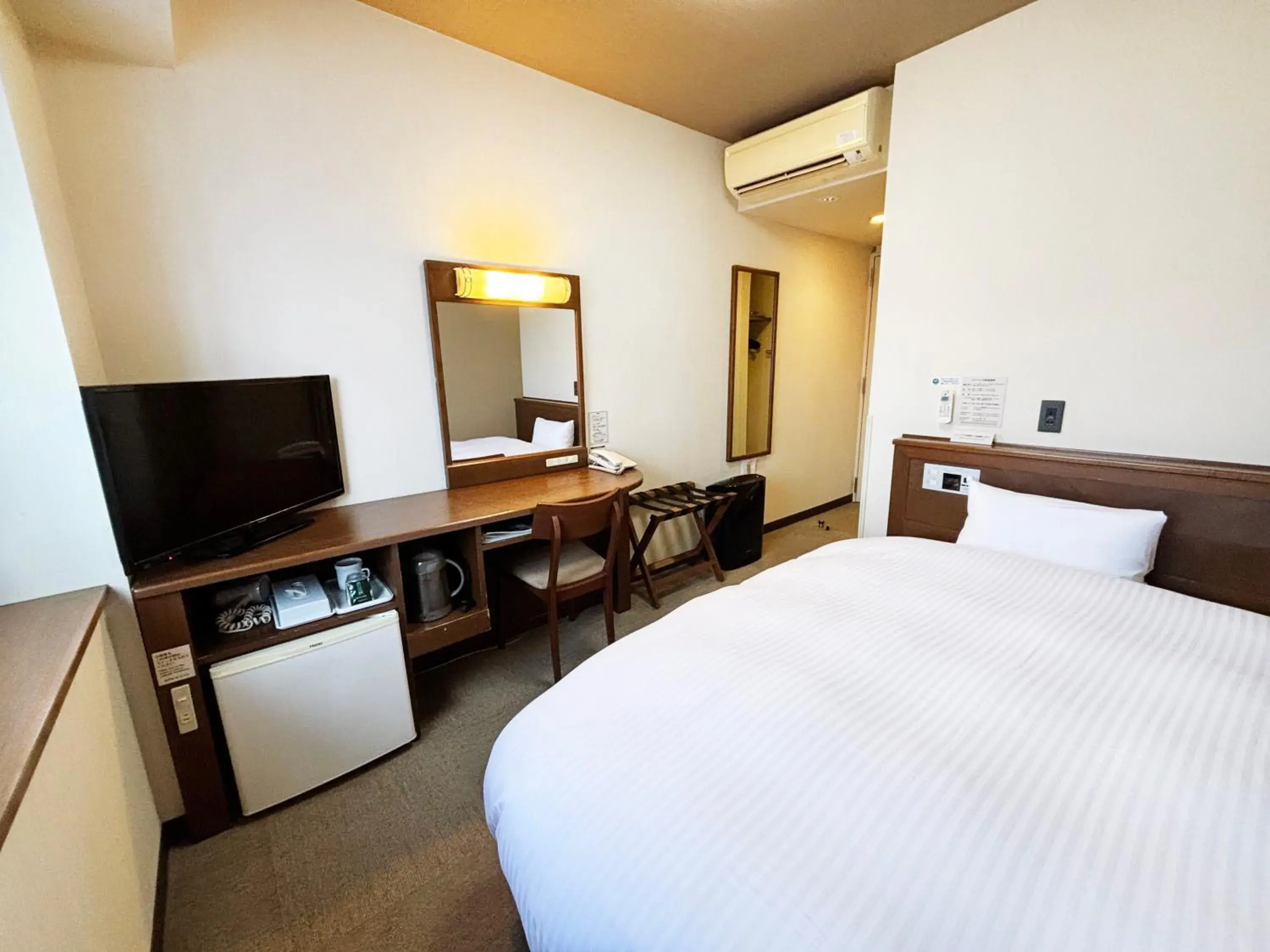 Bedroom in Hotel Route-Inn Nanao Ekihigashi Bedroom in Hotel Route-Inn Nanao Ekihigashi