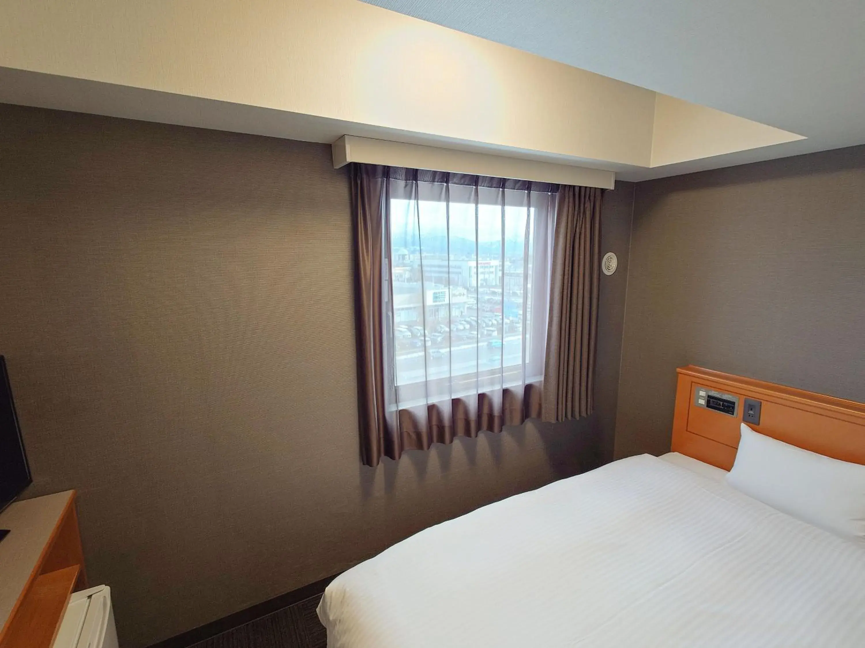 Photo of the whole room, Bed in Hotel Route-Inn Nagaoka Inter Photo of the whole room, Bed in Hotel Route-Inn Nagaoka Inter