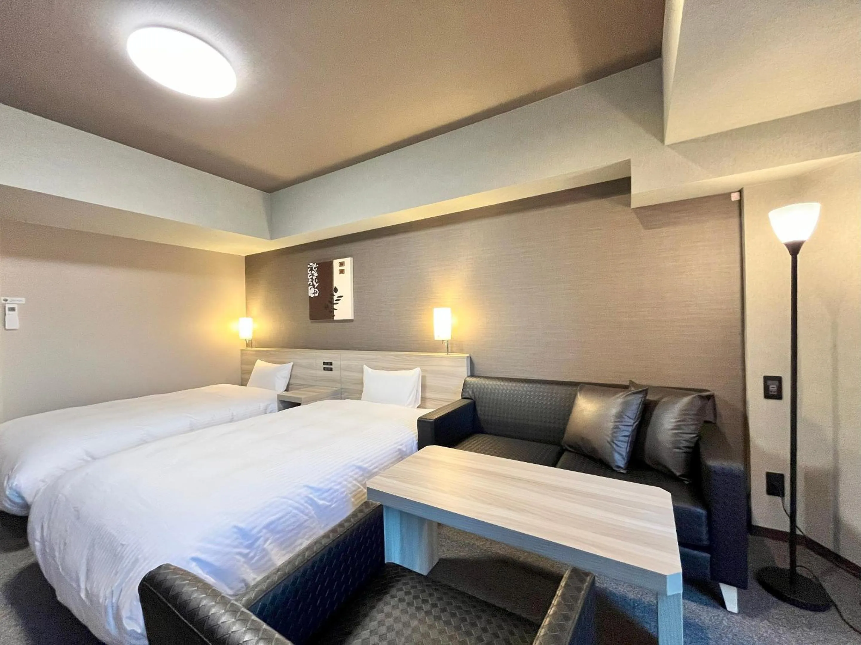 Photo of the whole room, Bed in Hotel Route-Inn Nagaoka Ekimae
