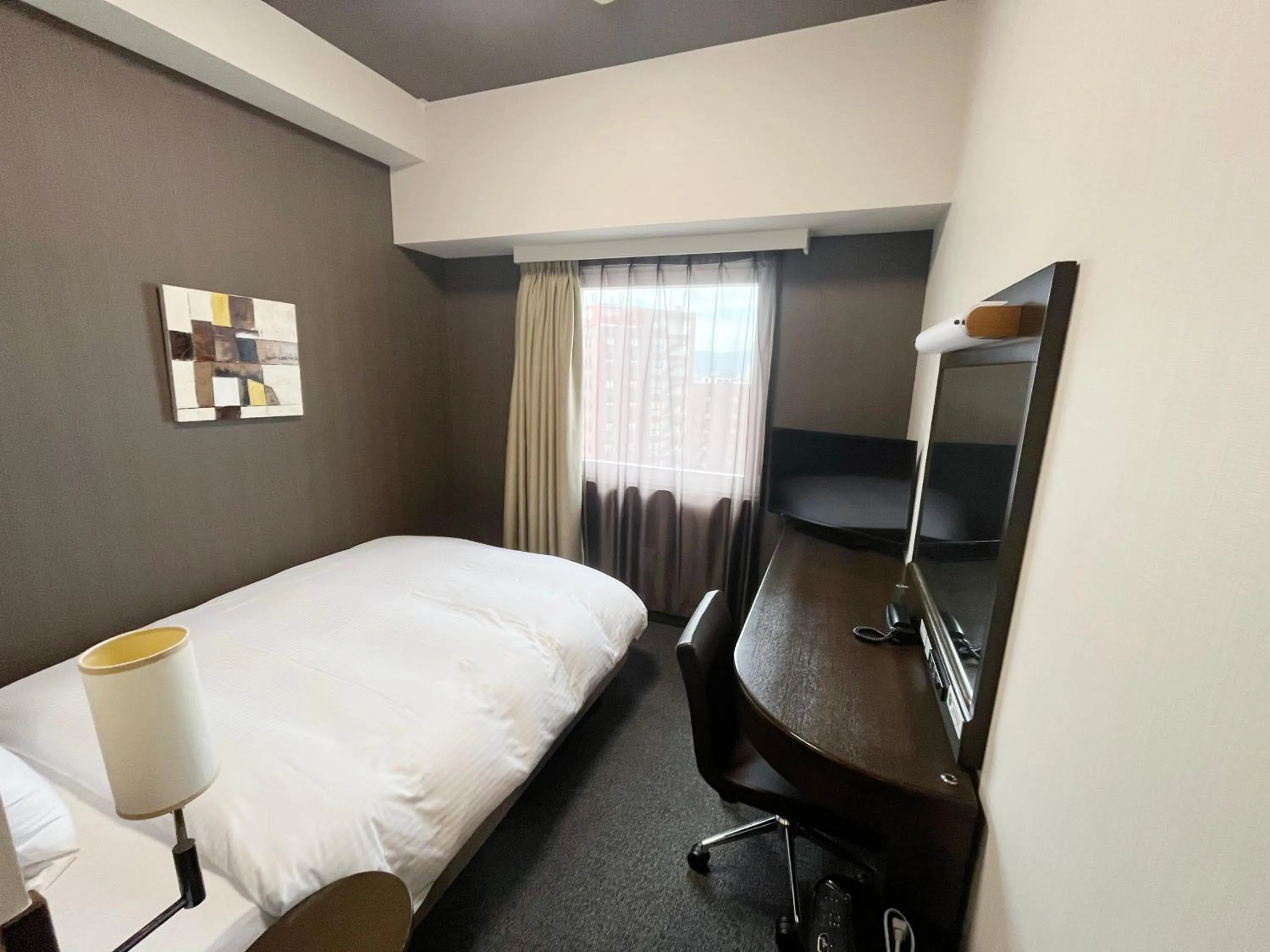 Photo of the whole room, Bed in Hotel Route-Inn Fukui Ekimae