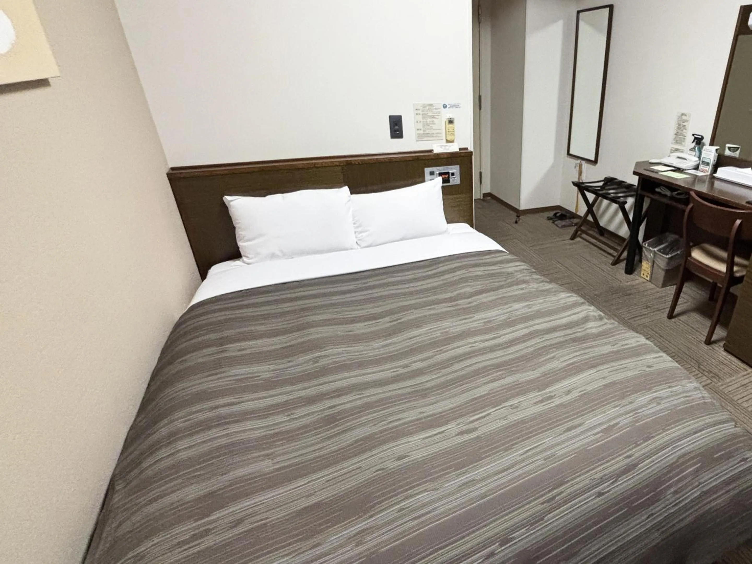 Photo of the whole room, Bed in Hotel Route-Inn Shibukawa