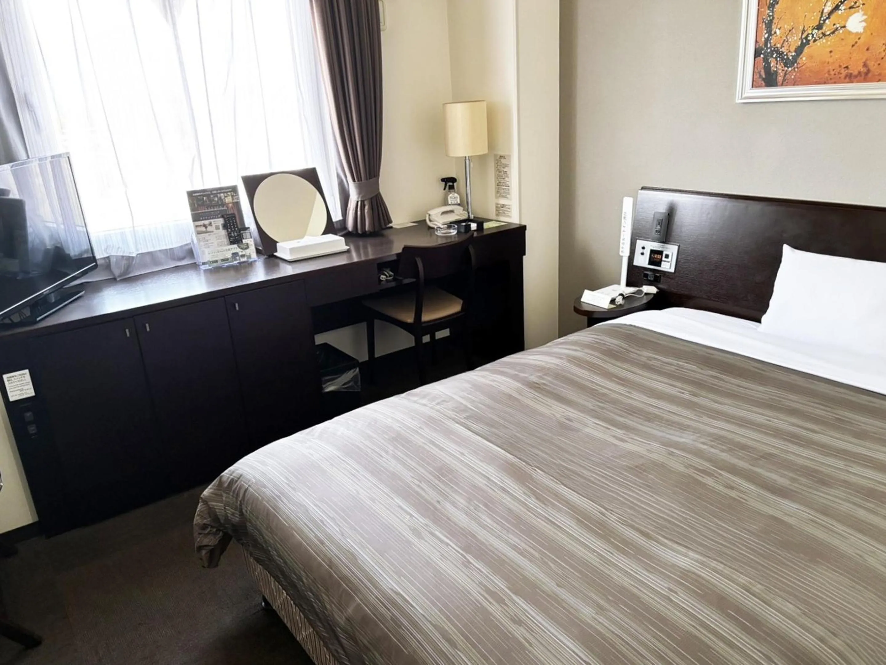 Photo of the whole room, Bed in Hotel Route-Inn Shibukawa