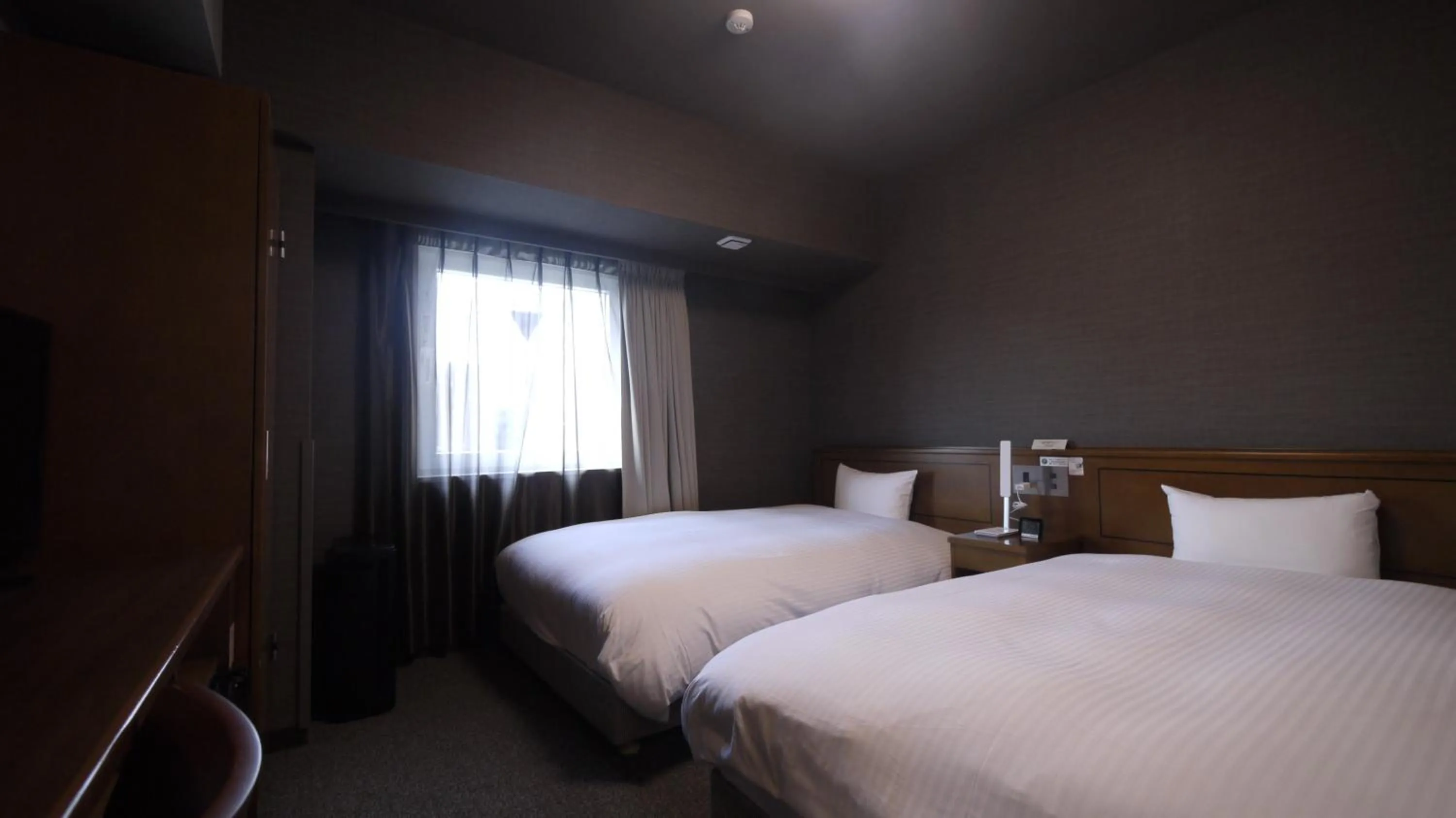 Photo of the whole room, Bed in Hotel Route-Inn Tsuruga Ekimae