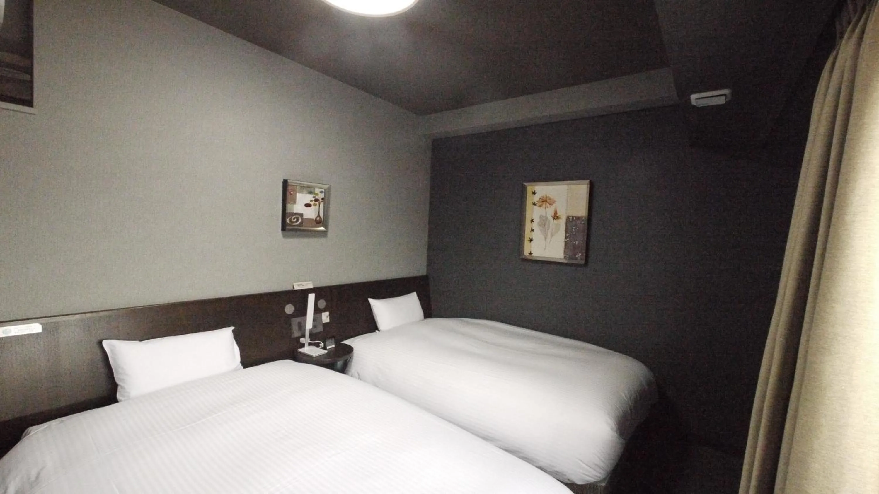Photo of the whole room, Bed in Hotel Route-Inn Tsuruga Ekimae