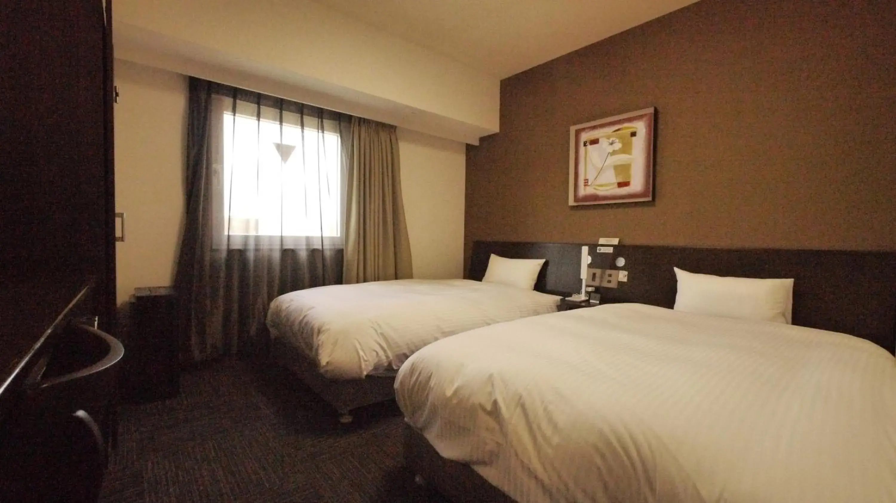Photo of the whole room, Bed in Hotel Route-Inn Tsuruga Ekimae Photo of the whole room, Bed in Hotel Route-Inn Tsuruga Ekimae