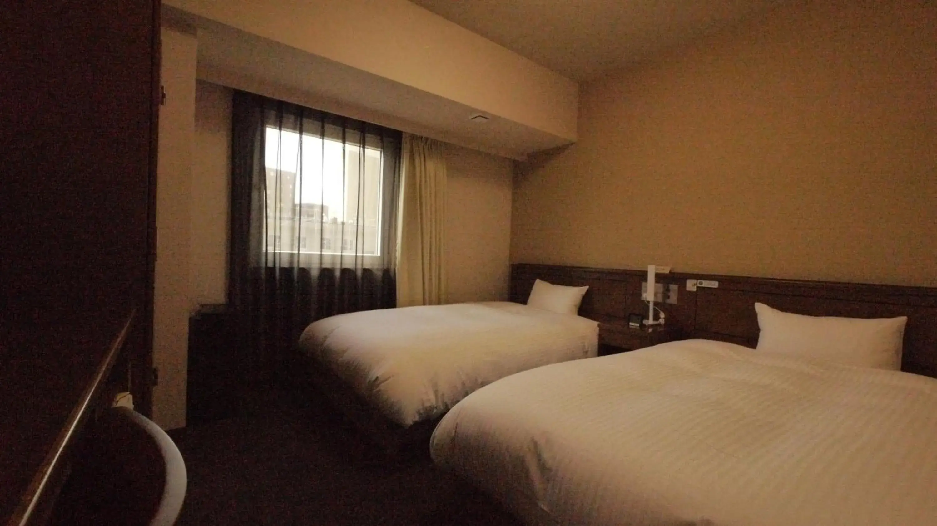 Photo of the whole room, Bed in Hotel Route-Inn Tsuruga Ekimae Photo of the whole room, Bed in Hotel Route-Inn Tsuruga Ekimae