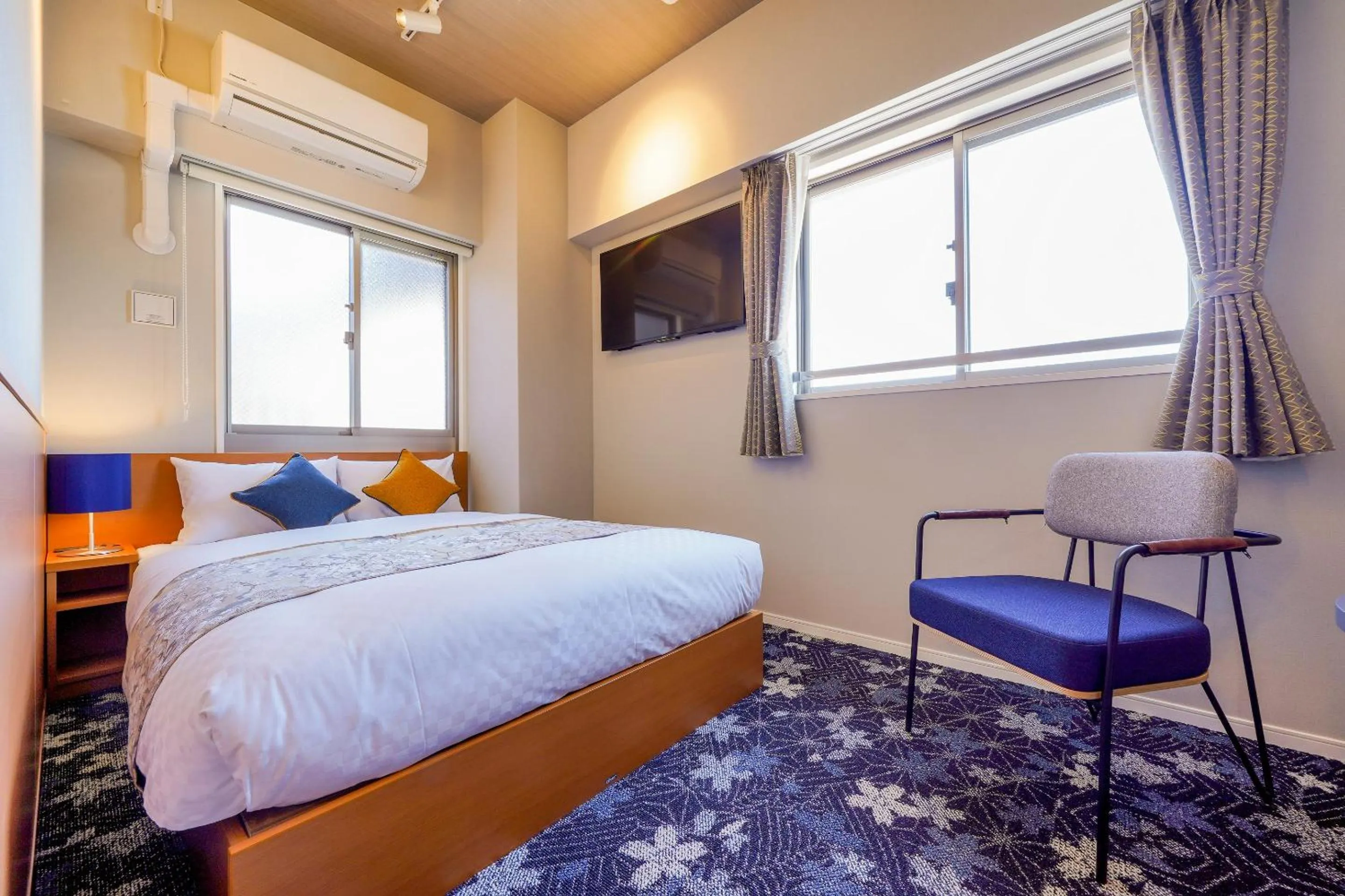 Bed in RESI STAY THE KYOTO