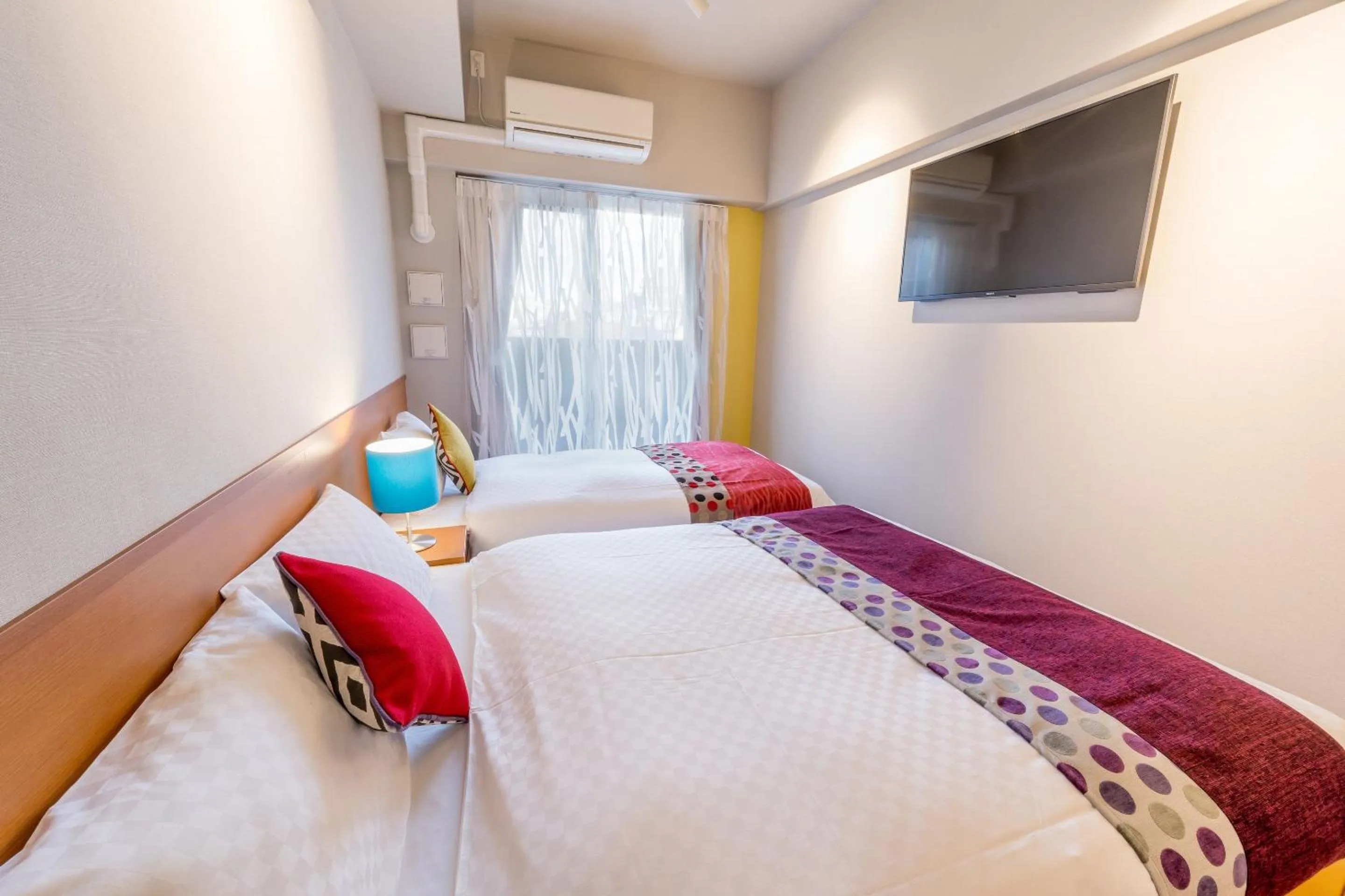 Bed in RESI STAY THE KYOTO