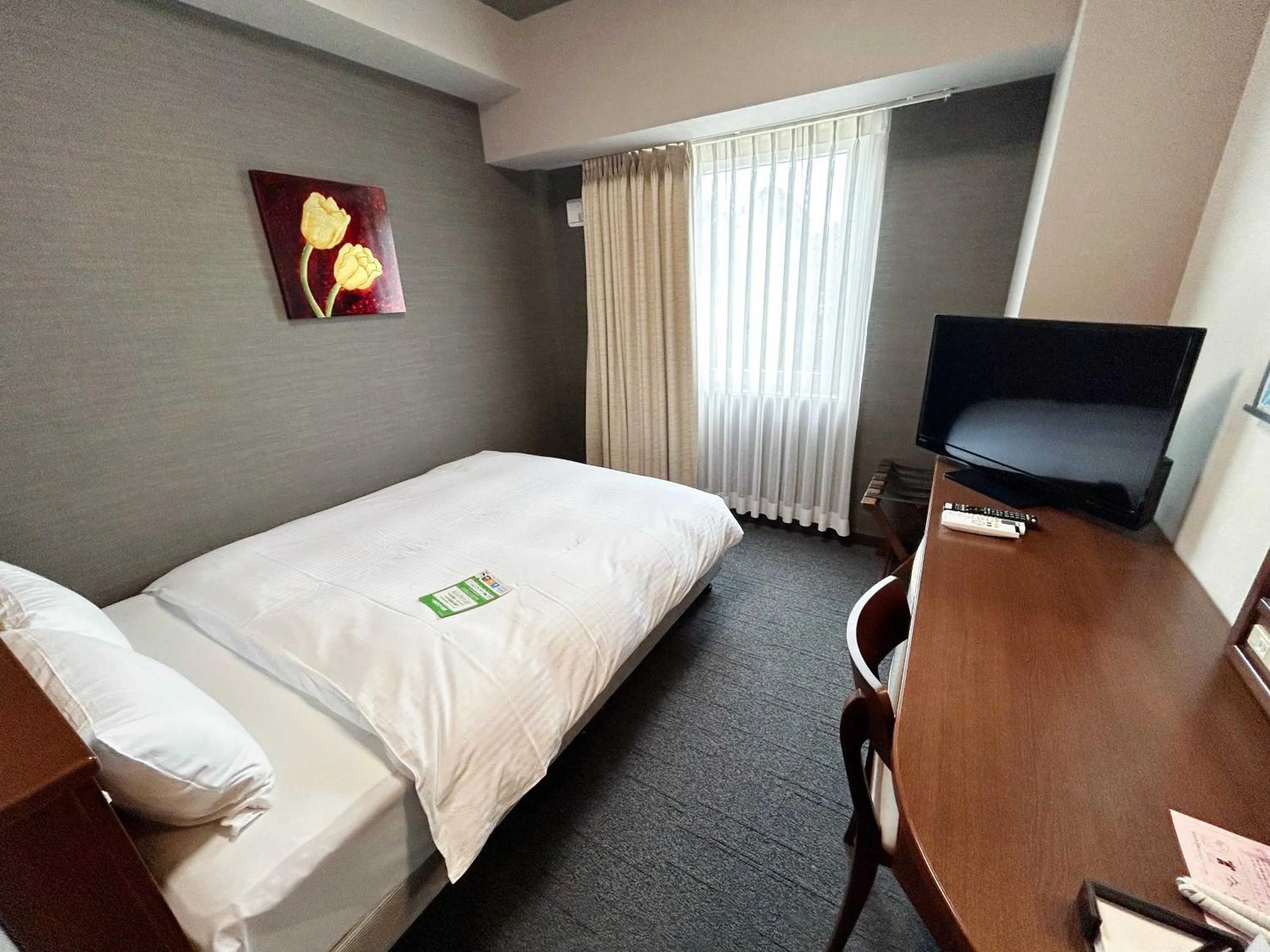 Photo of the whole room, Bed in Hotel Route-Inn Iwata Inter