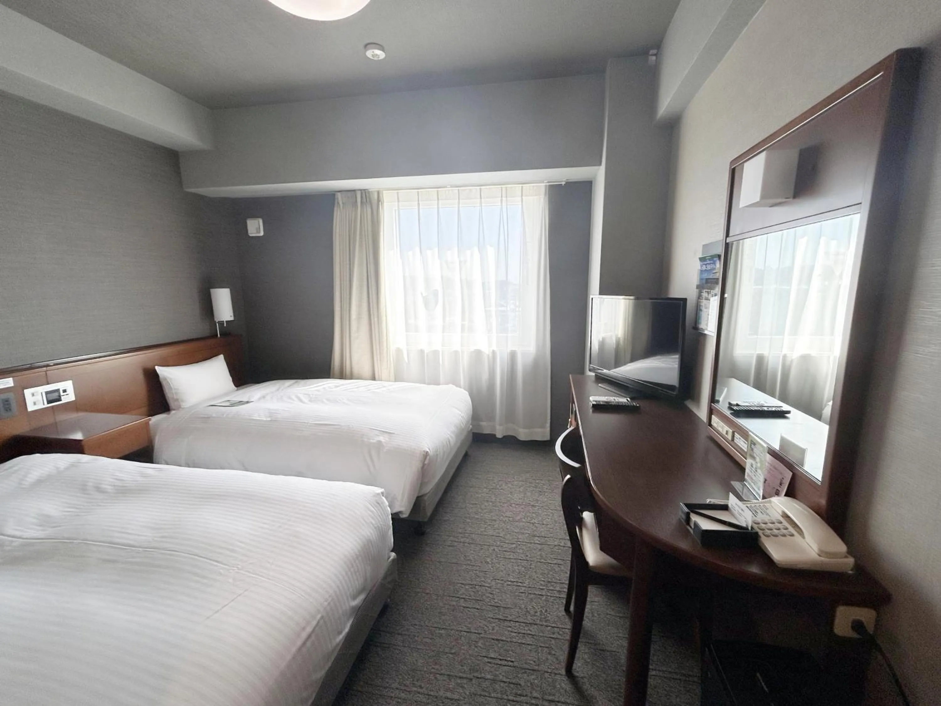 Photo of the whole room, Bed in Hotel Route-Inn Iwata Inter