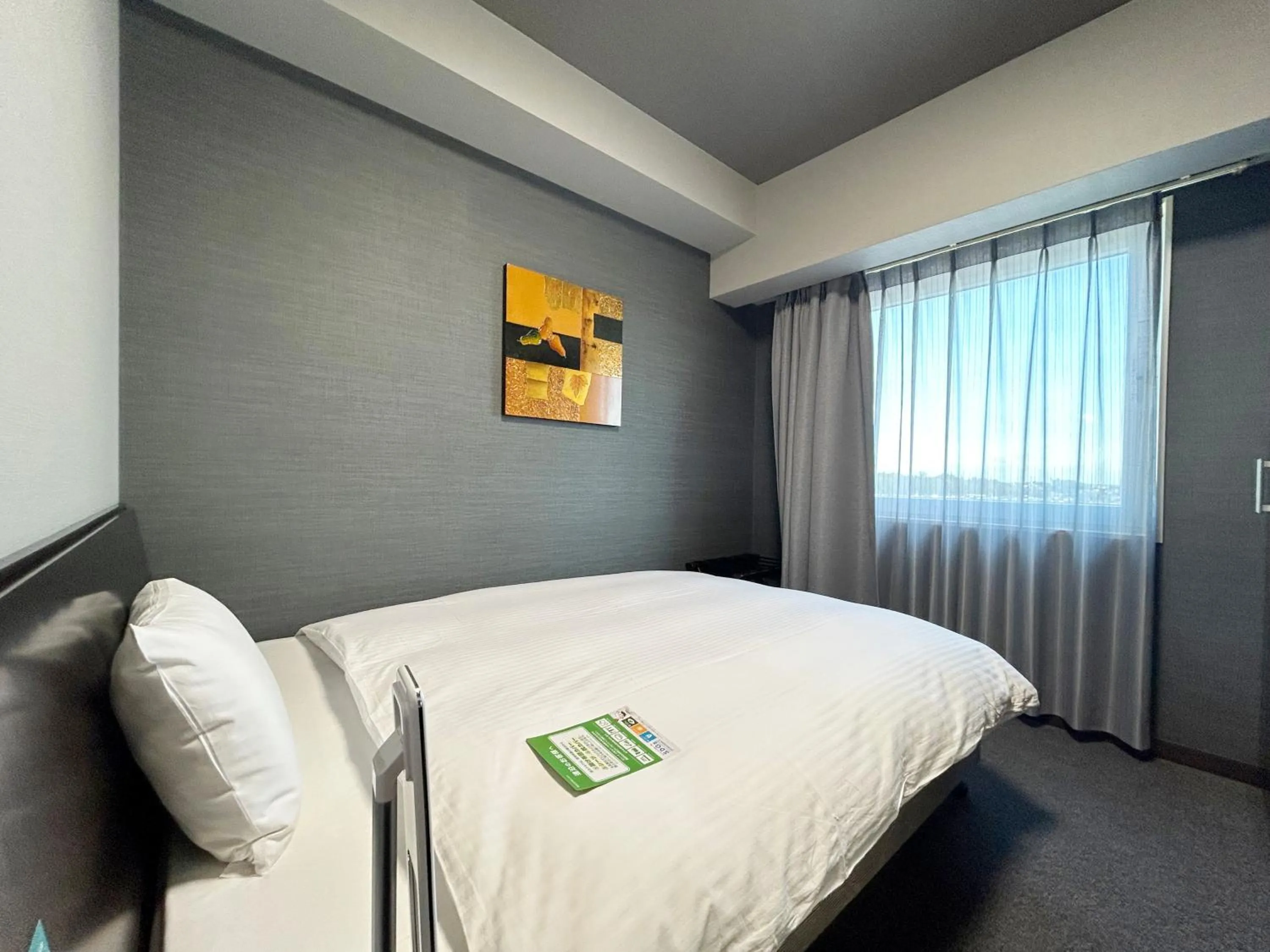 Photo of the whole room, Bed in Hotel Route-Inn Iwata Inter