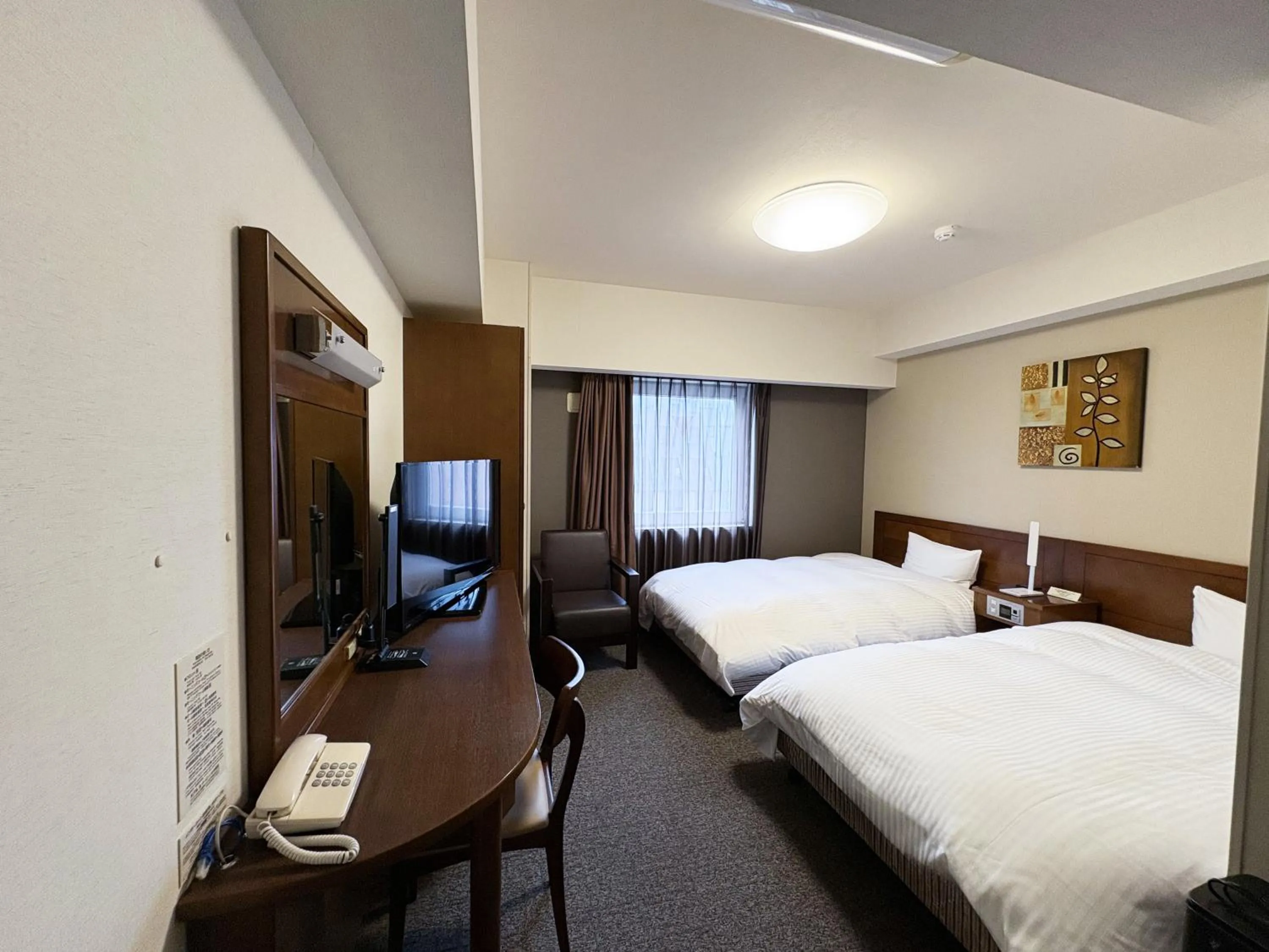 Photo of the whole room, Bed in Hotel Route-Inn Iwaki Ekimae