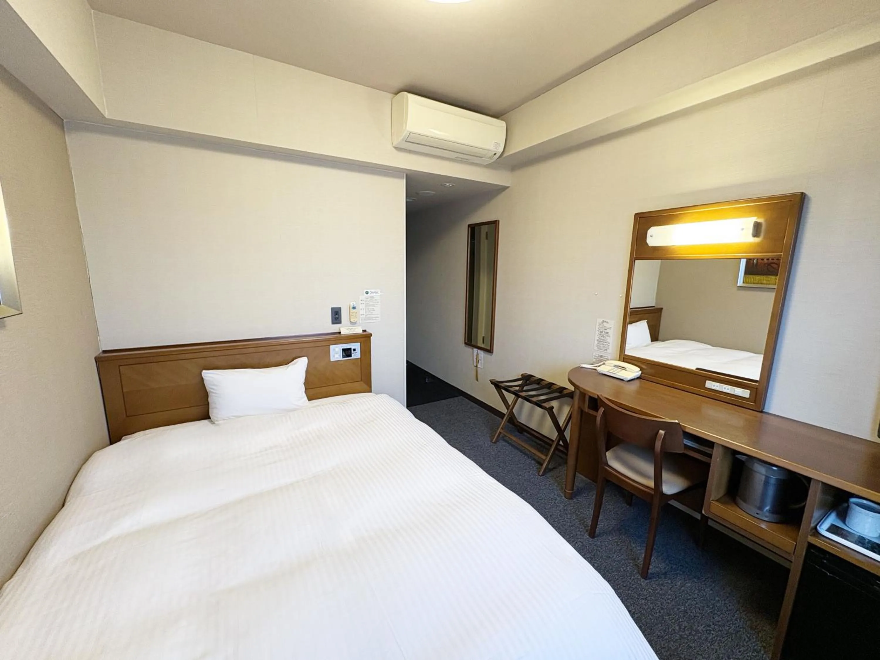 Photo of the whole room, Bed in Hotel Route-Inn Iwaki Ekimae