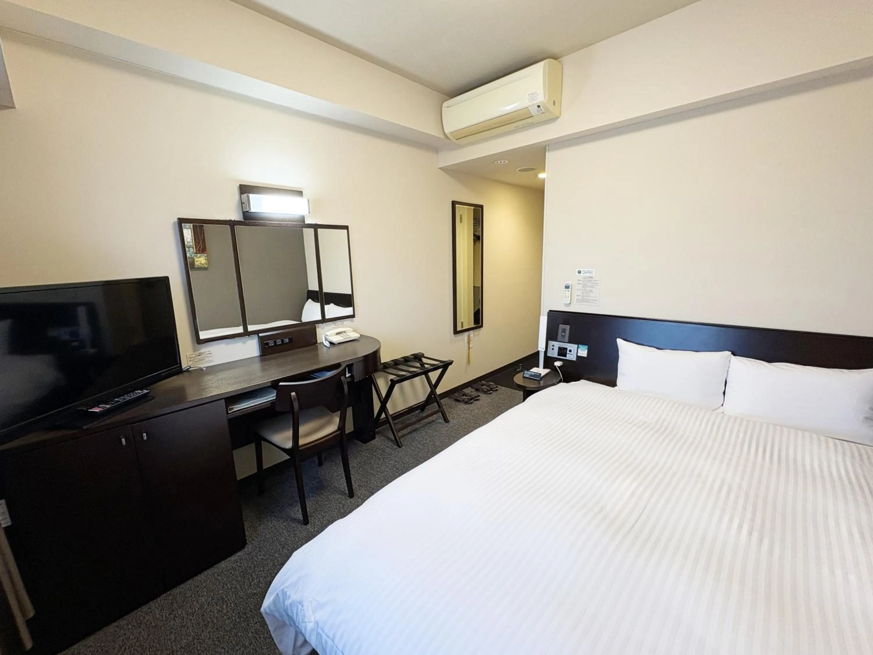Photo of the whole room, Bed in Hotel Route-Inn Iwaki Ekimae