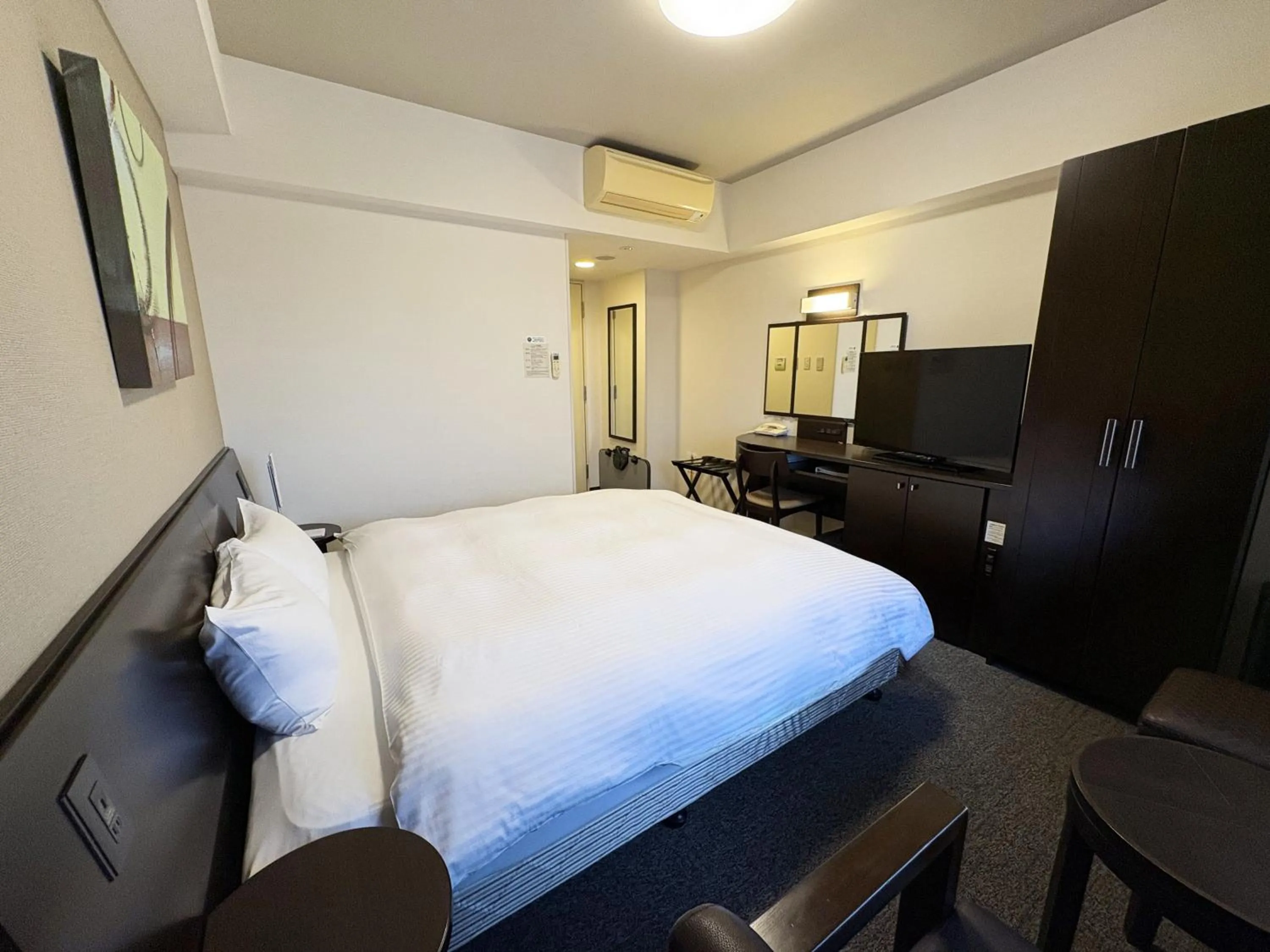 Photo of the whole room, Bed in Hotel Route-Inn Iwaki Ekimae