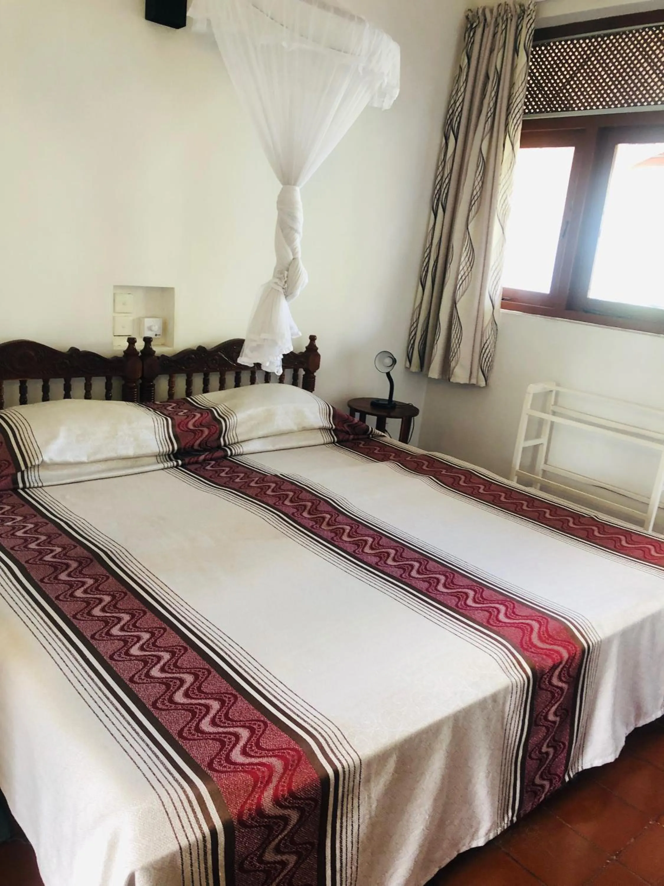 Bed in Hotel Hemadan