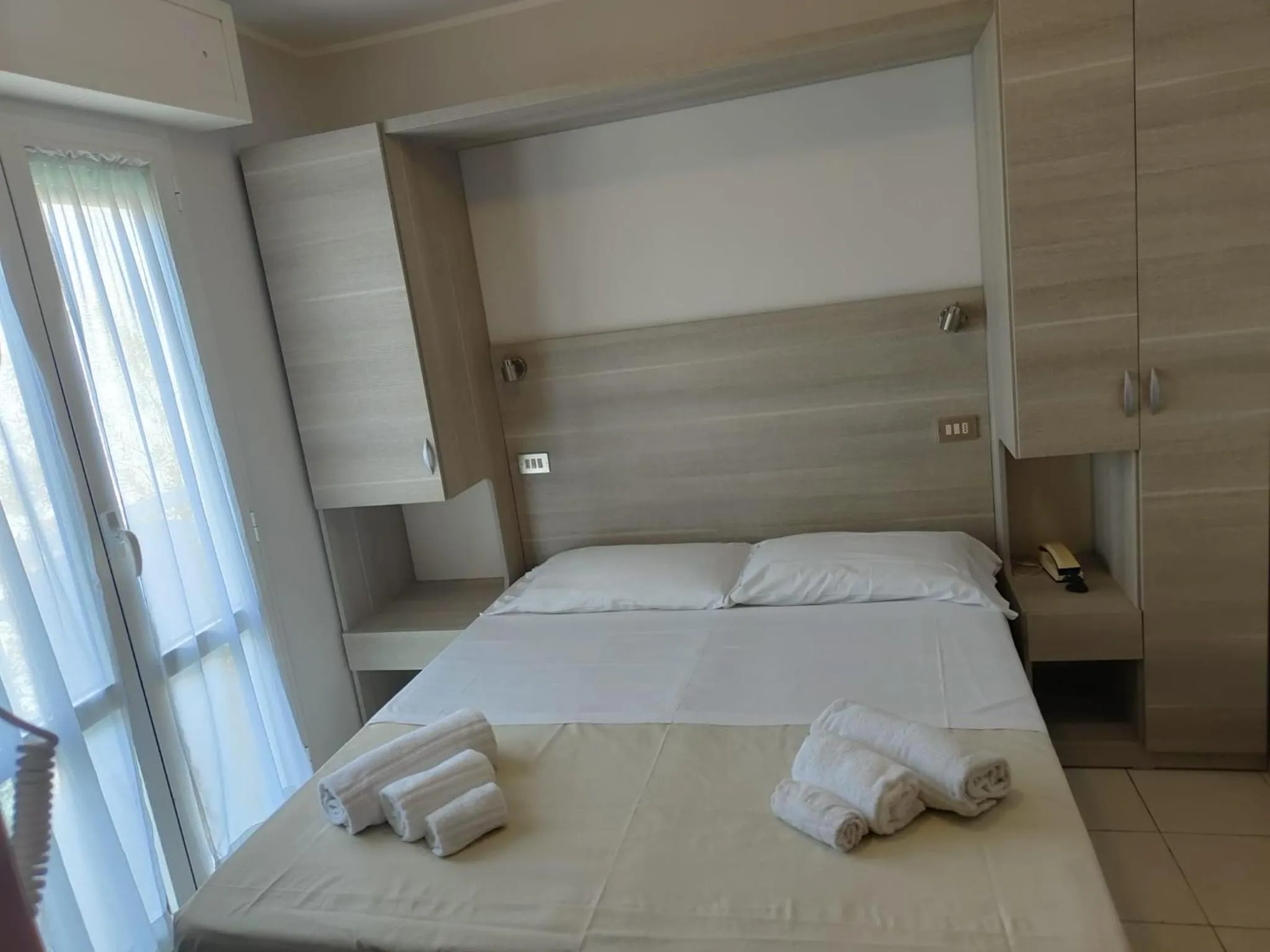 View (from property/room), Bed in Hotel Gioiella