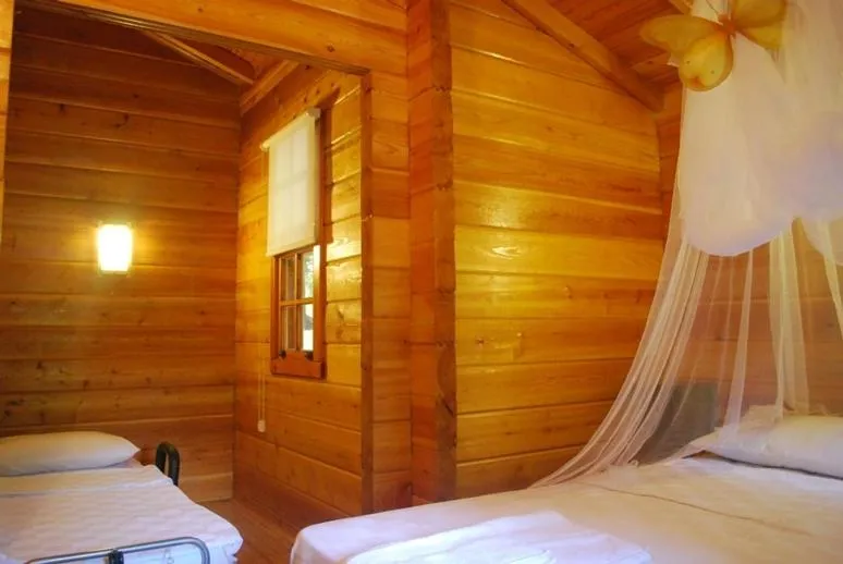 Bed in Portalimo Lodge Hotel - Adult Only +12
