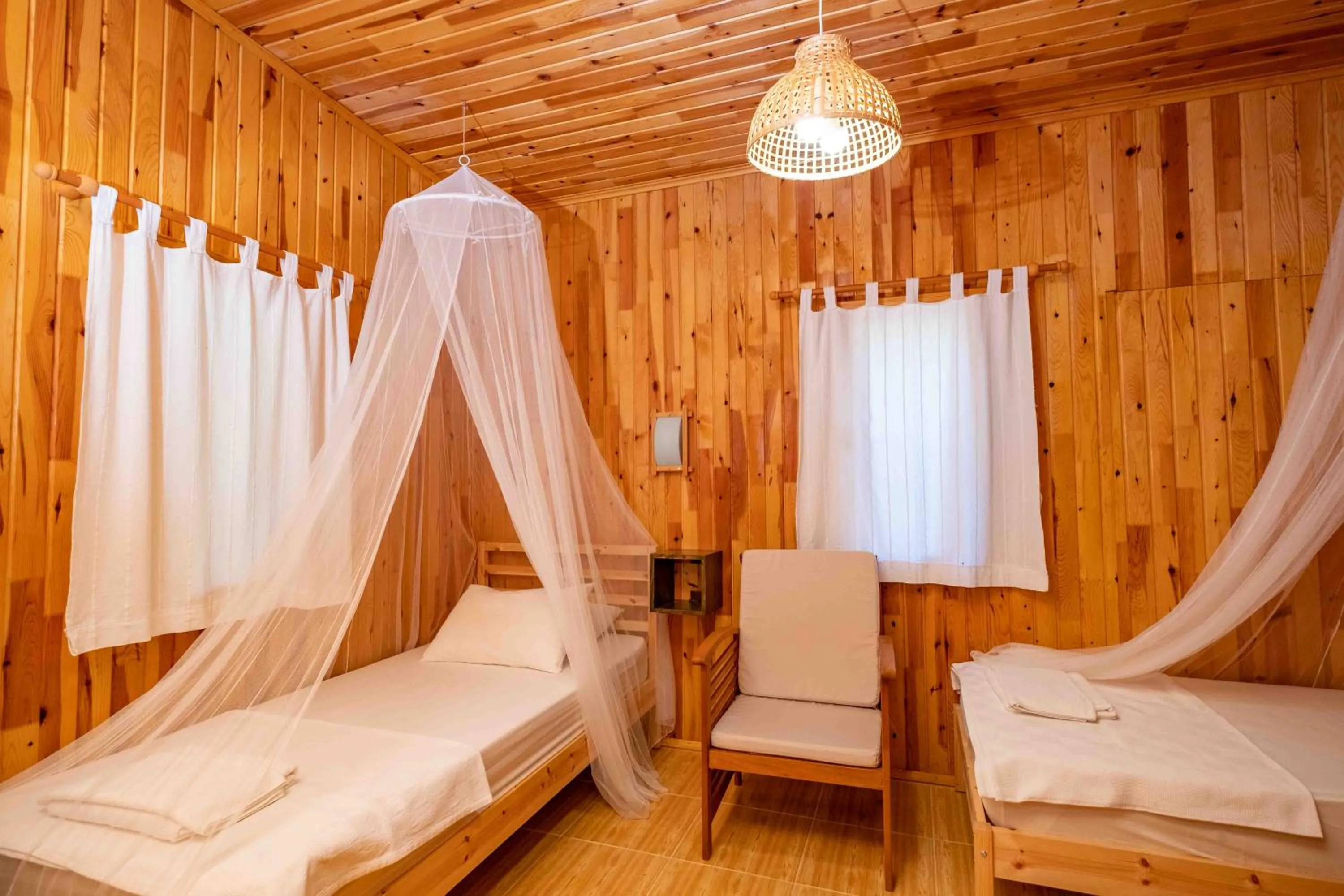 Bed in Portalimo Lodge Hotel - Adult Only +12