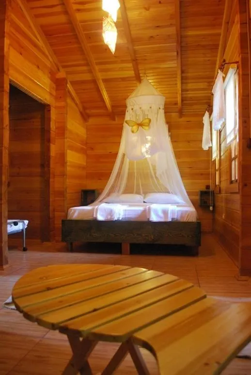 Bed in Portalimo Lodge Hotel - Adult Only +12