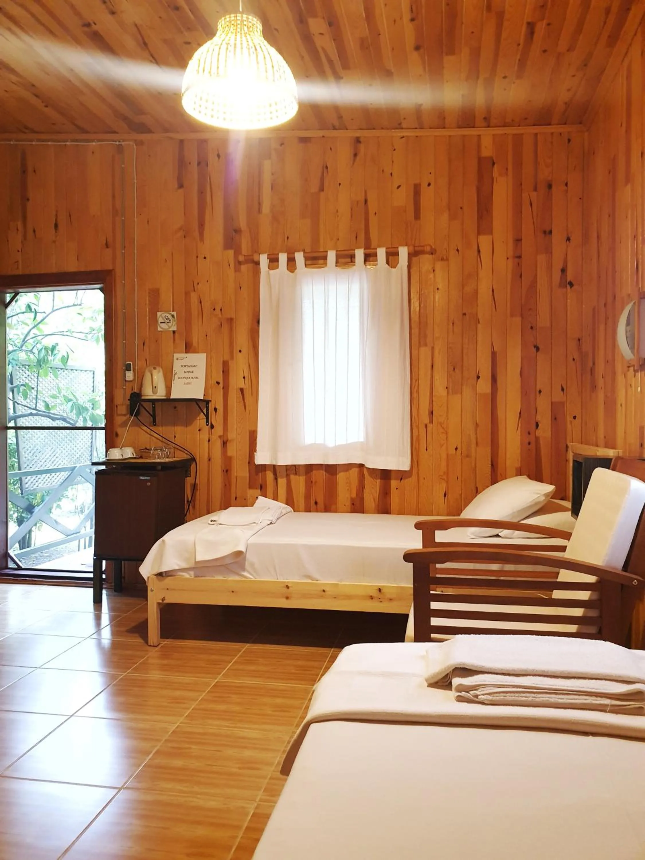 Photo of the whole room, Bed in Portalimo Lodge Hotel - Adult Only +12