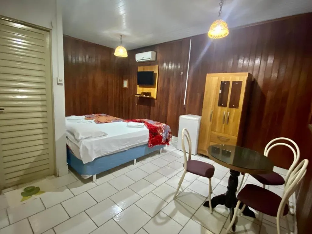 Bed in Pousada Encantos da Amazônia