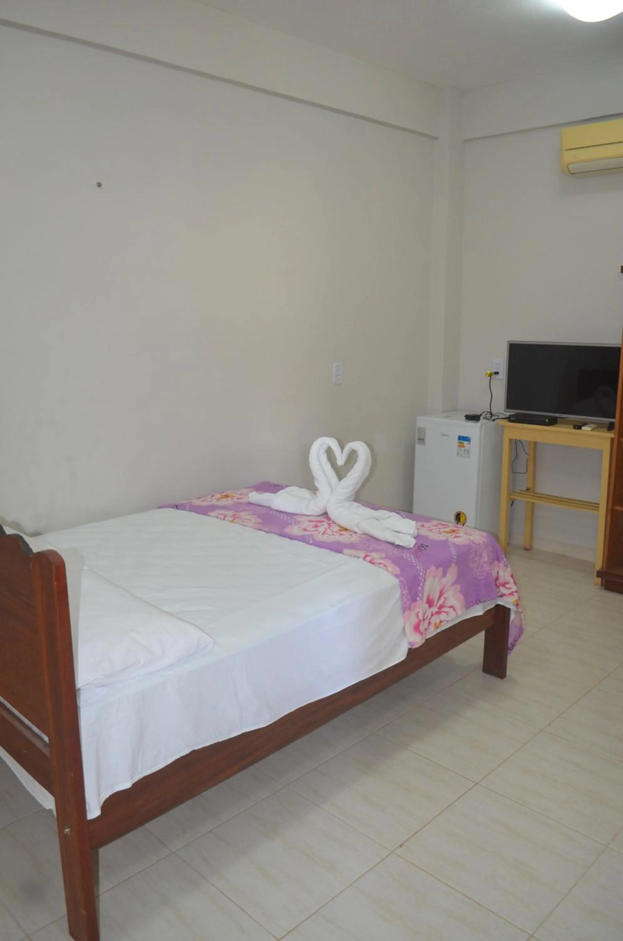 Bed in Pousada Encantos da Amazônia