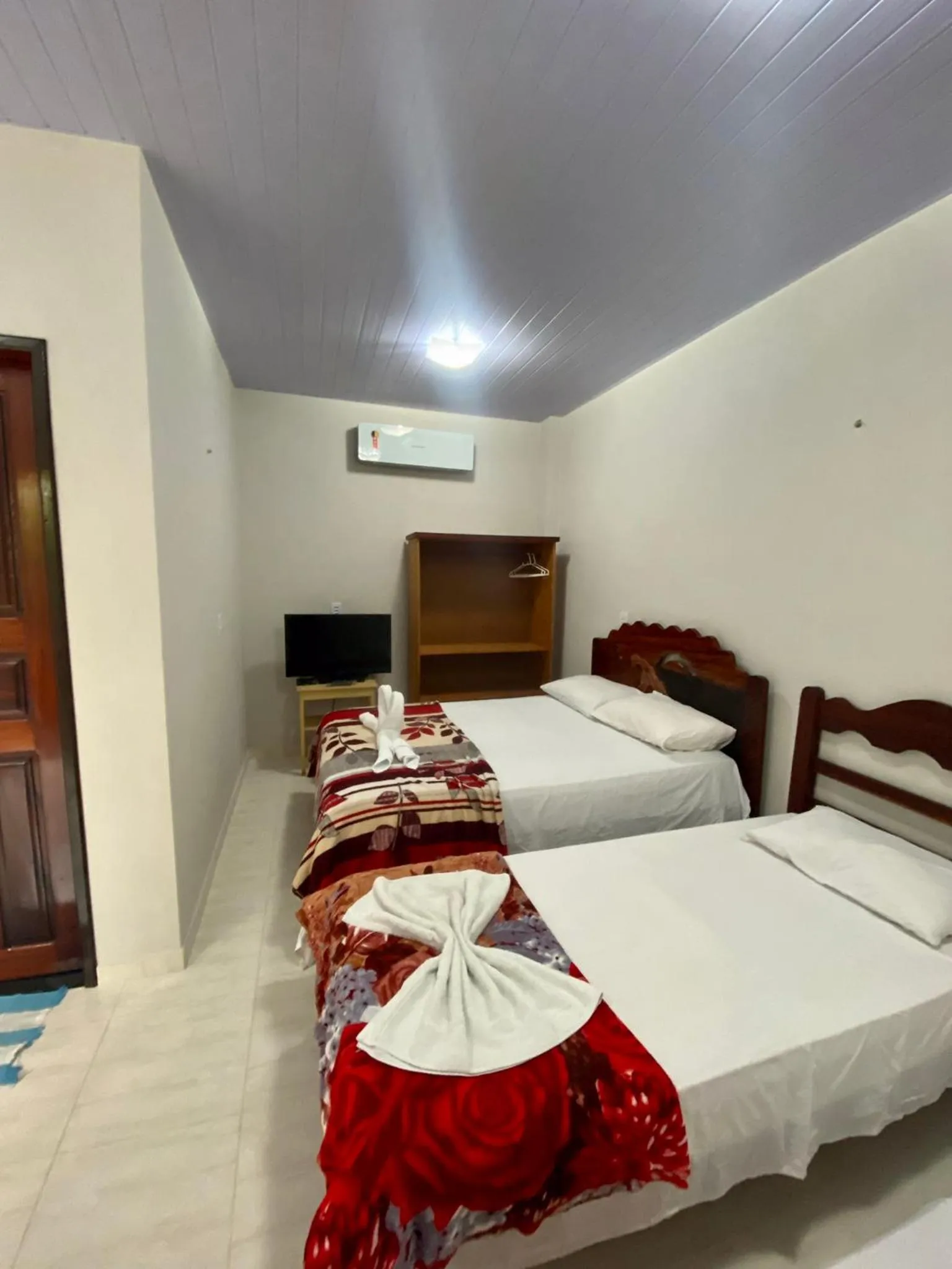 Bed in Pousada Encantos da Amazônia