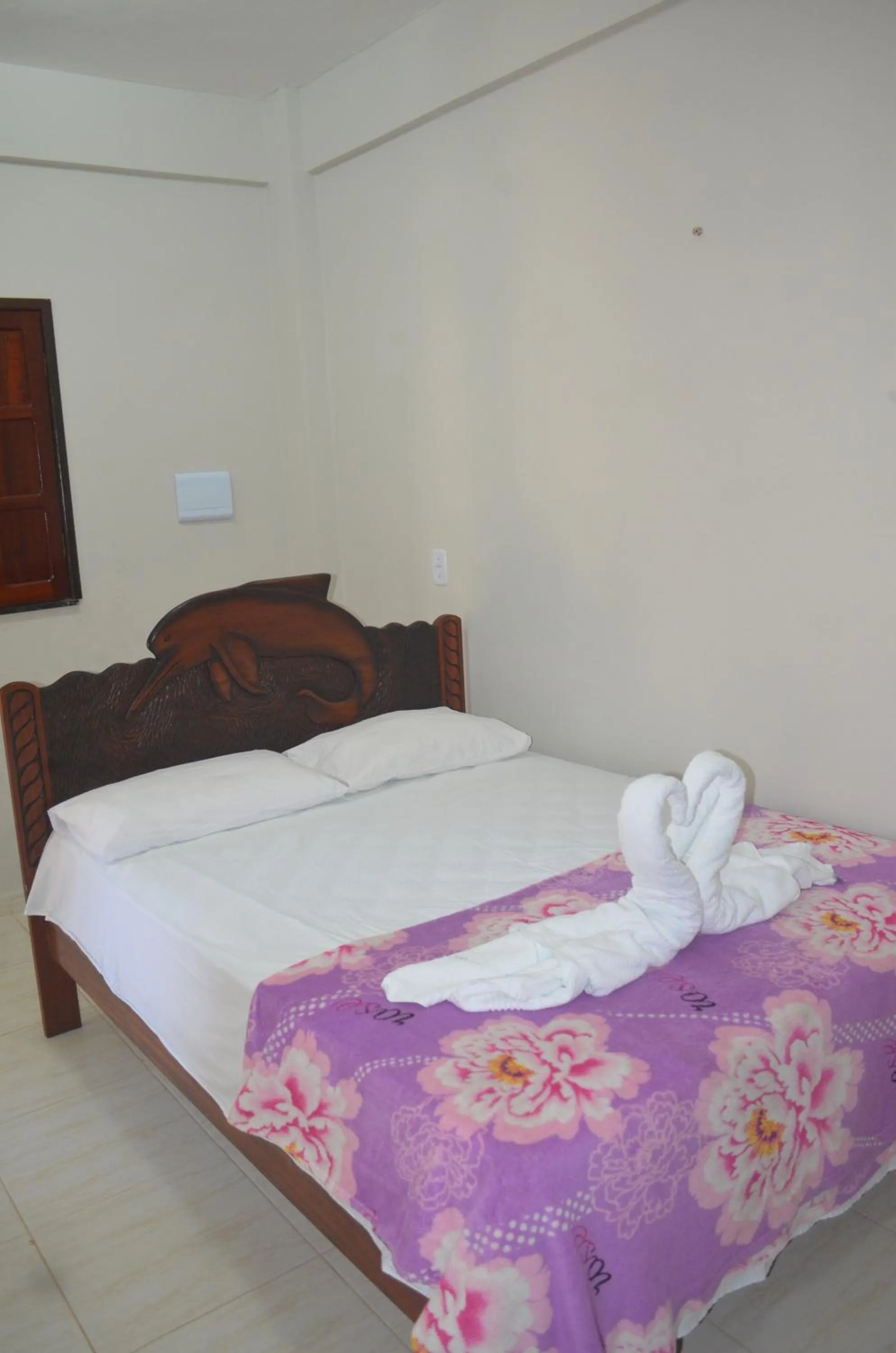 Bed in Pousada Encantos da Amazônia