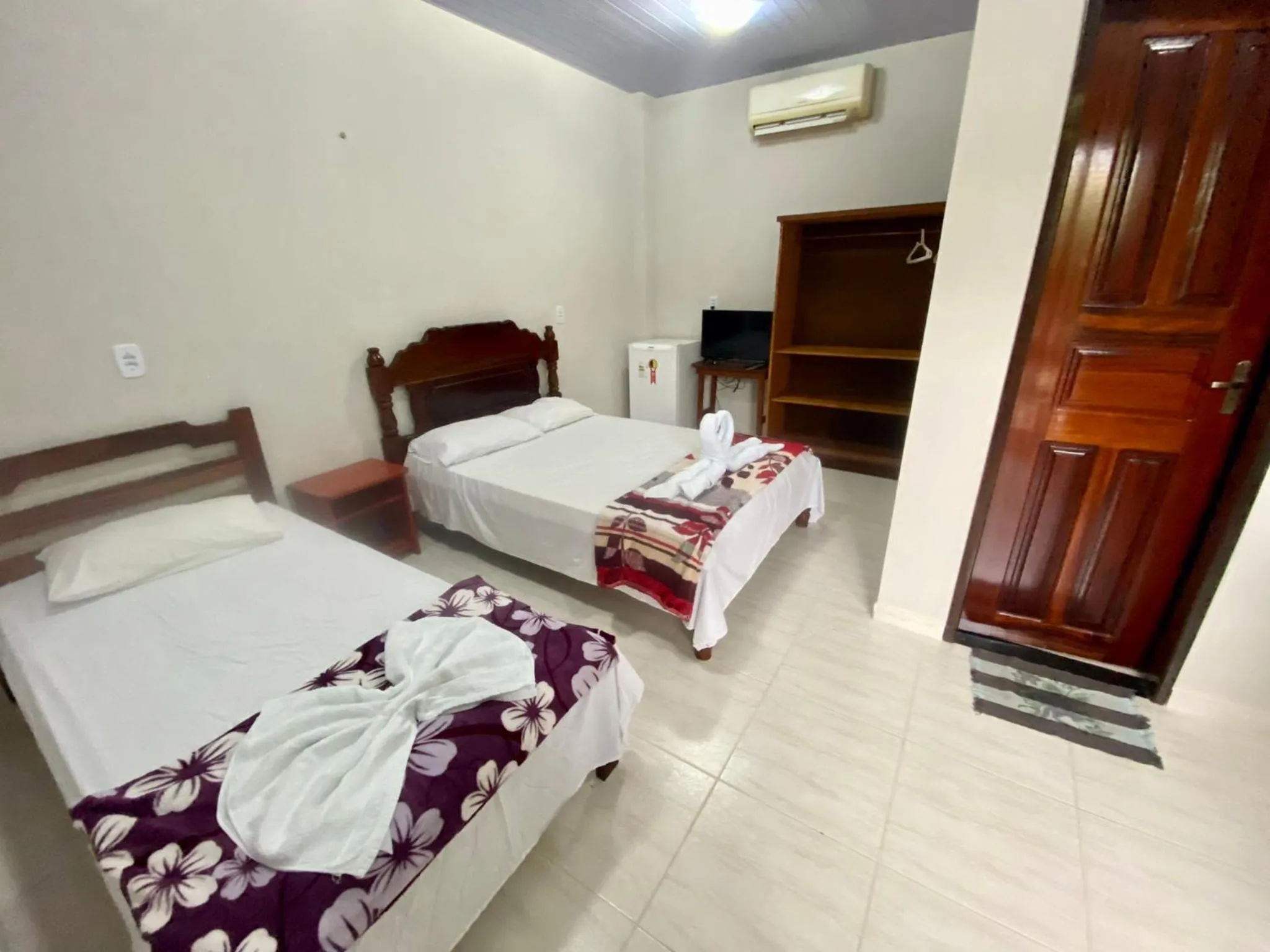 Bed in Pousada Encantos da Amazônia