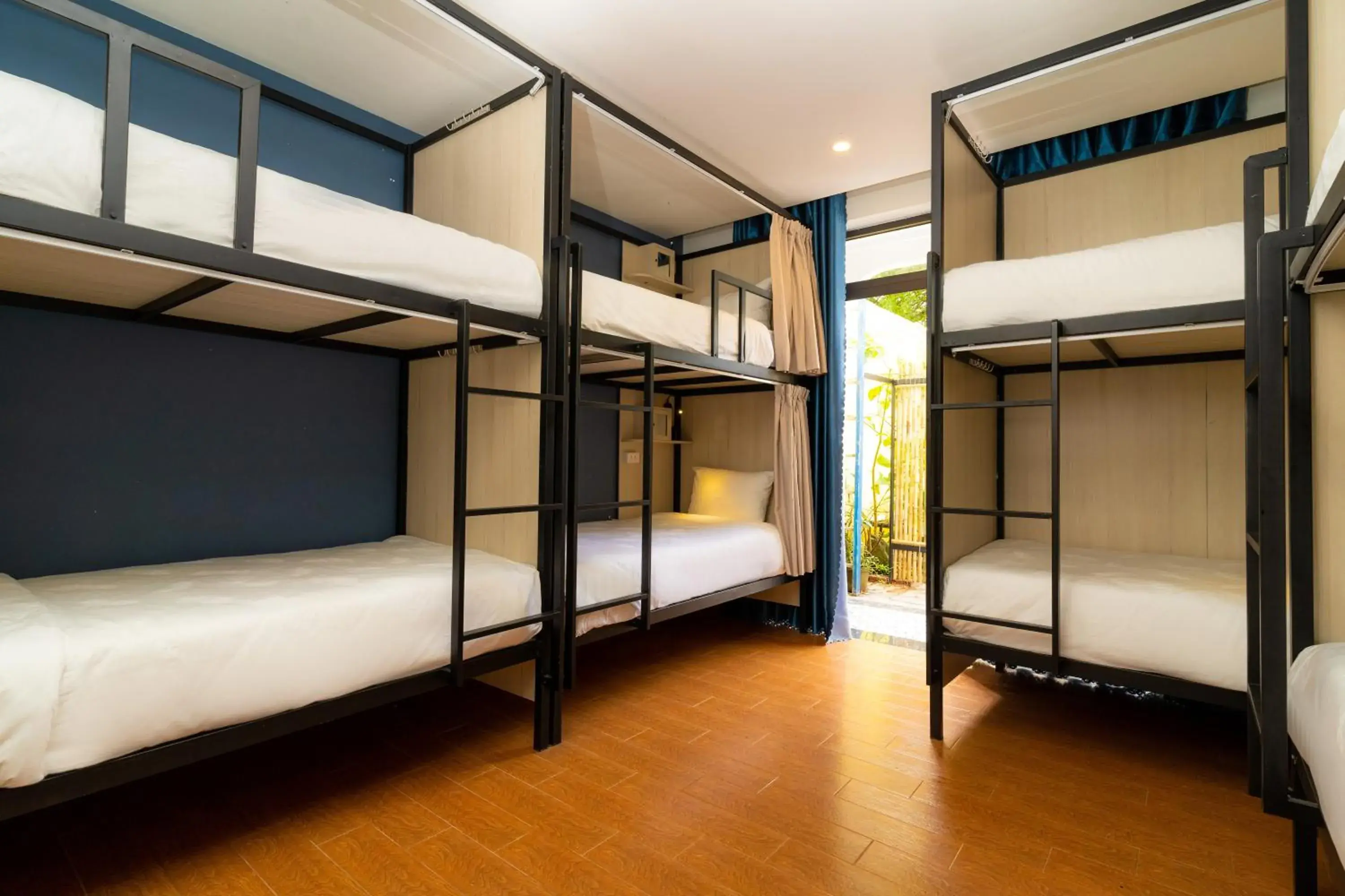 Bed in 8-Bed Dormitory Room in The Cuckoo's Nest Hostel and Bar managed by Hoianese Bed in 8-Bed Dormitory Room in The Cuckoo's Nest Hostel and Bar managed by Hoianese