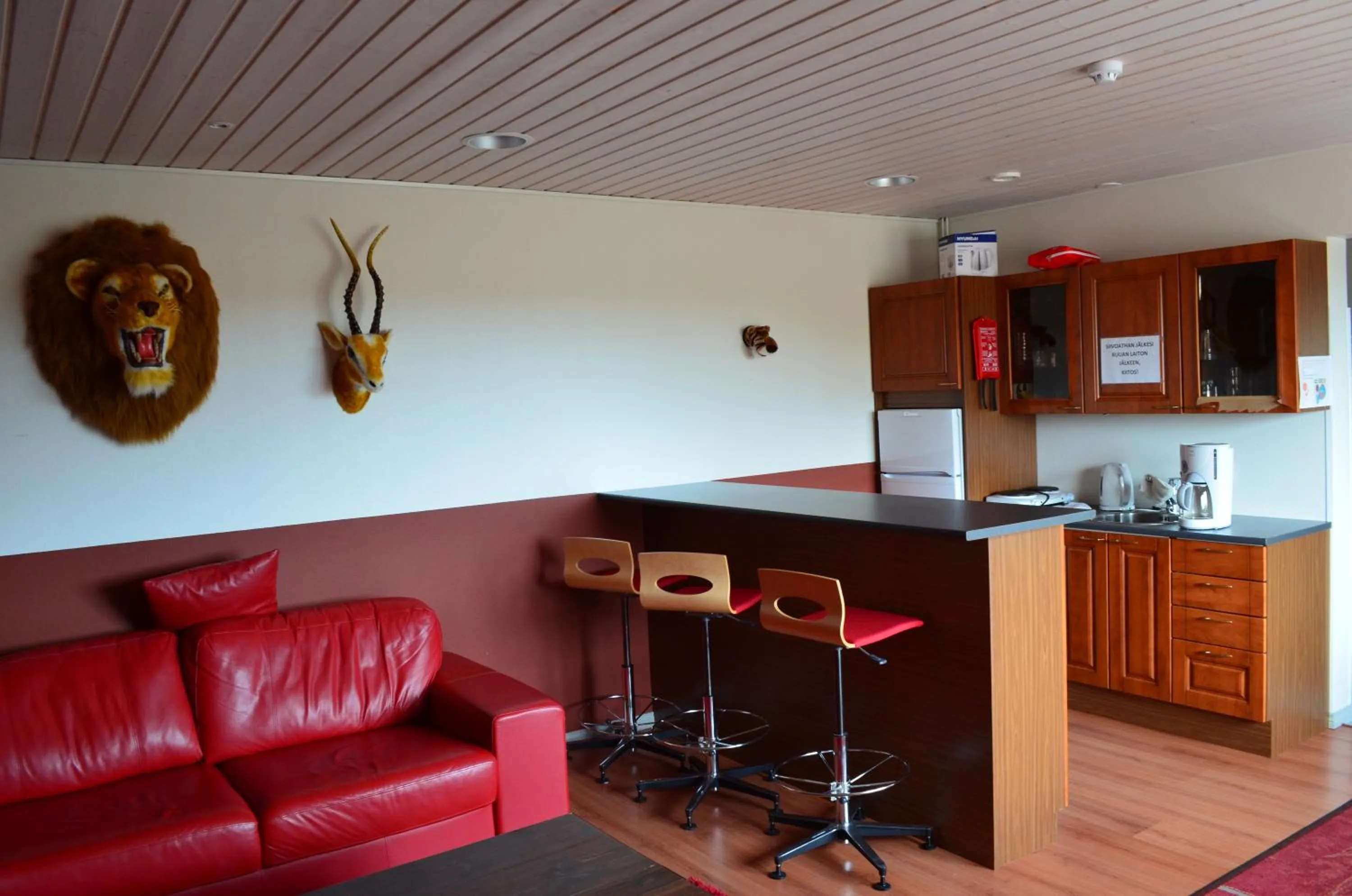 Communal lounge/ TV room in Hotel Reima Country Center