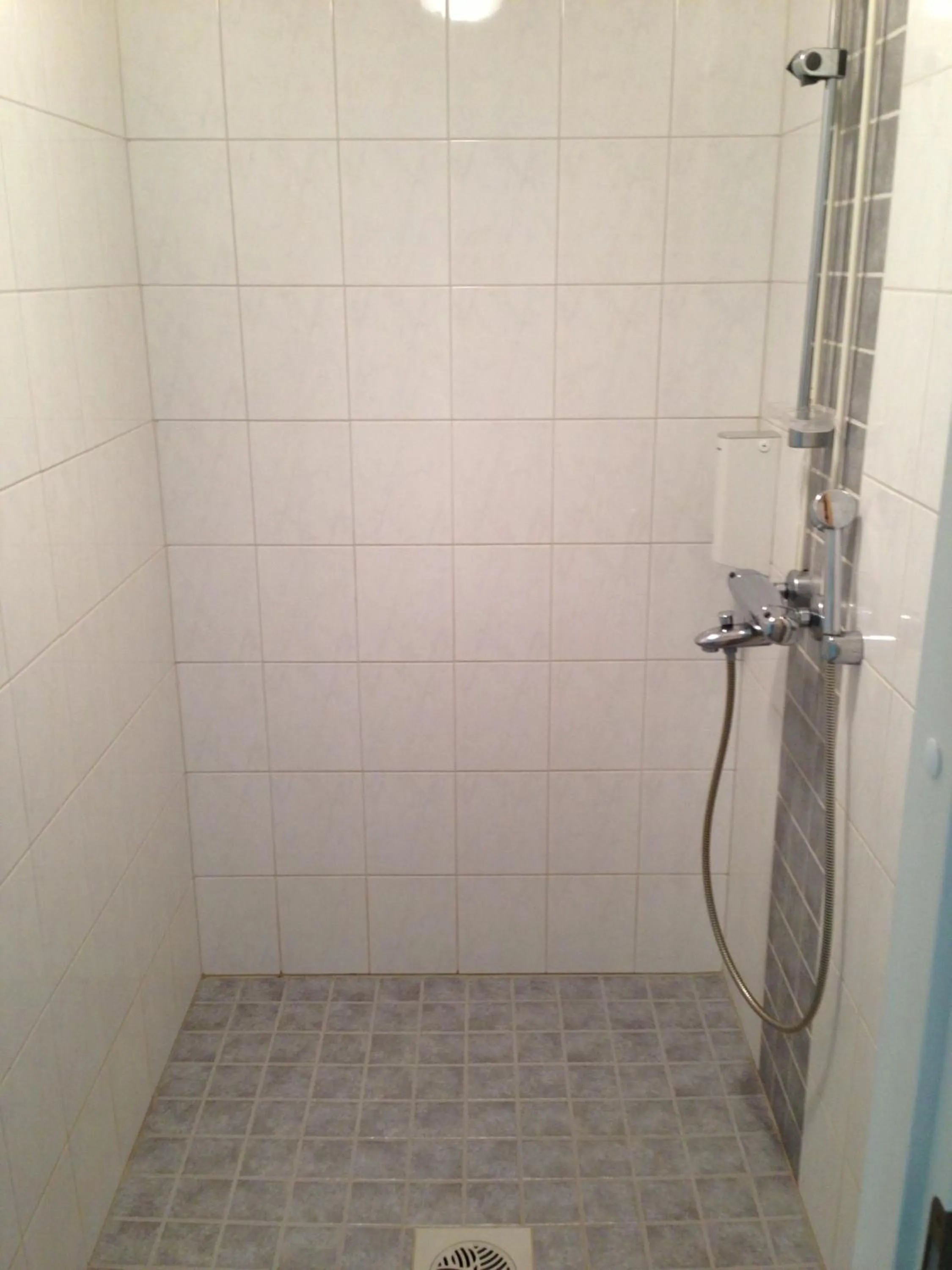 Shower in Huoneistohotelli Lumihovi