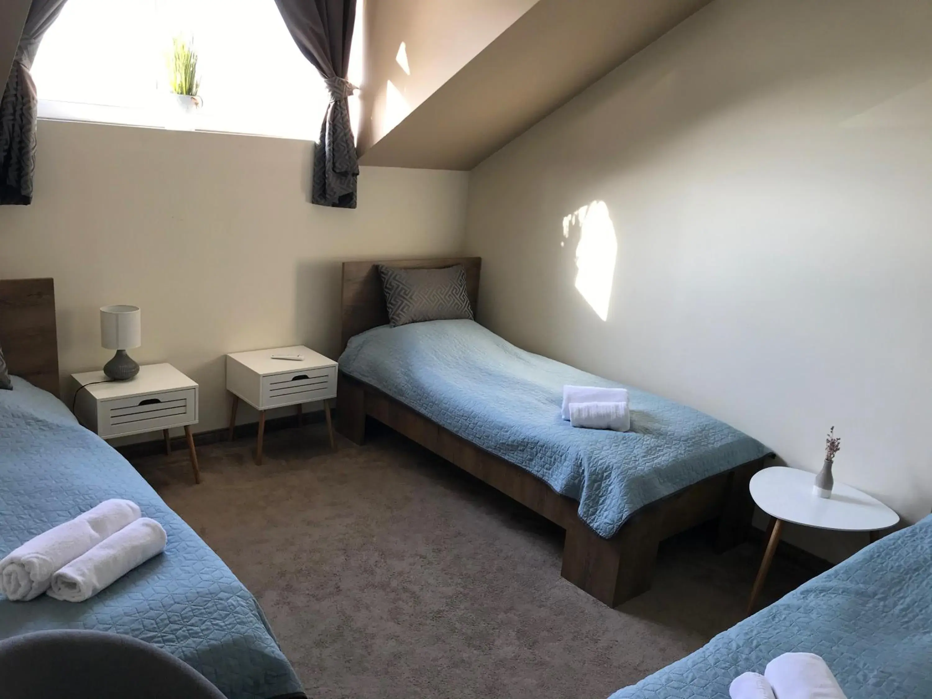 Triple Room with Private Bathroom in Sempre Étterem És Panzió Triple Room with Private Bathroom in Sempre Étterem És Panzió