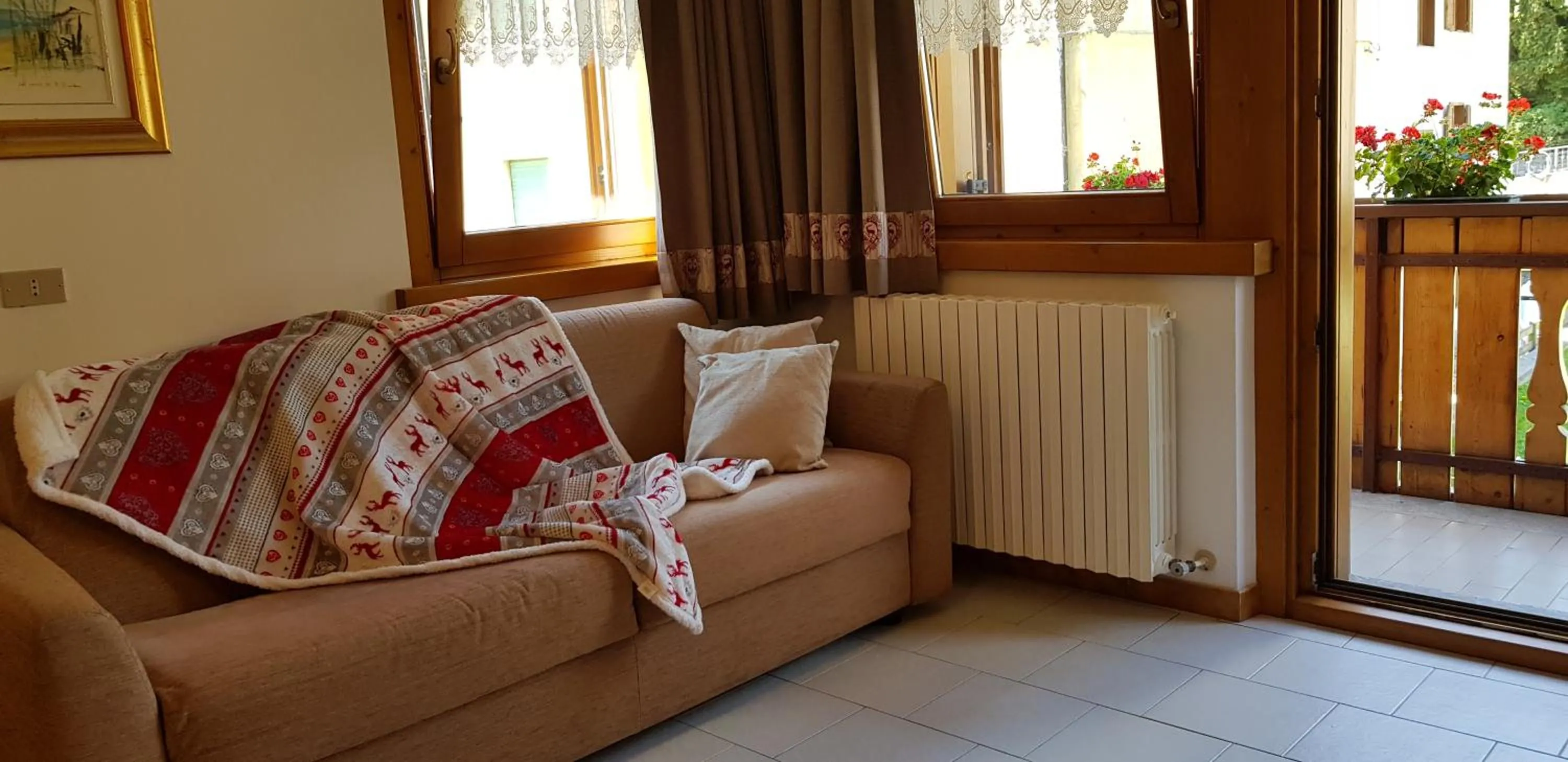Living room in Baita al Pian