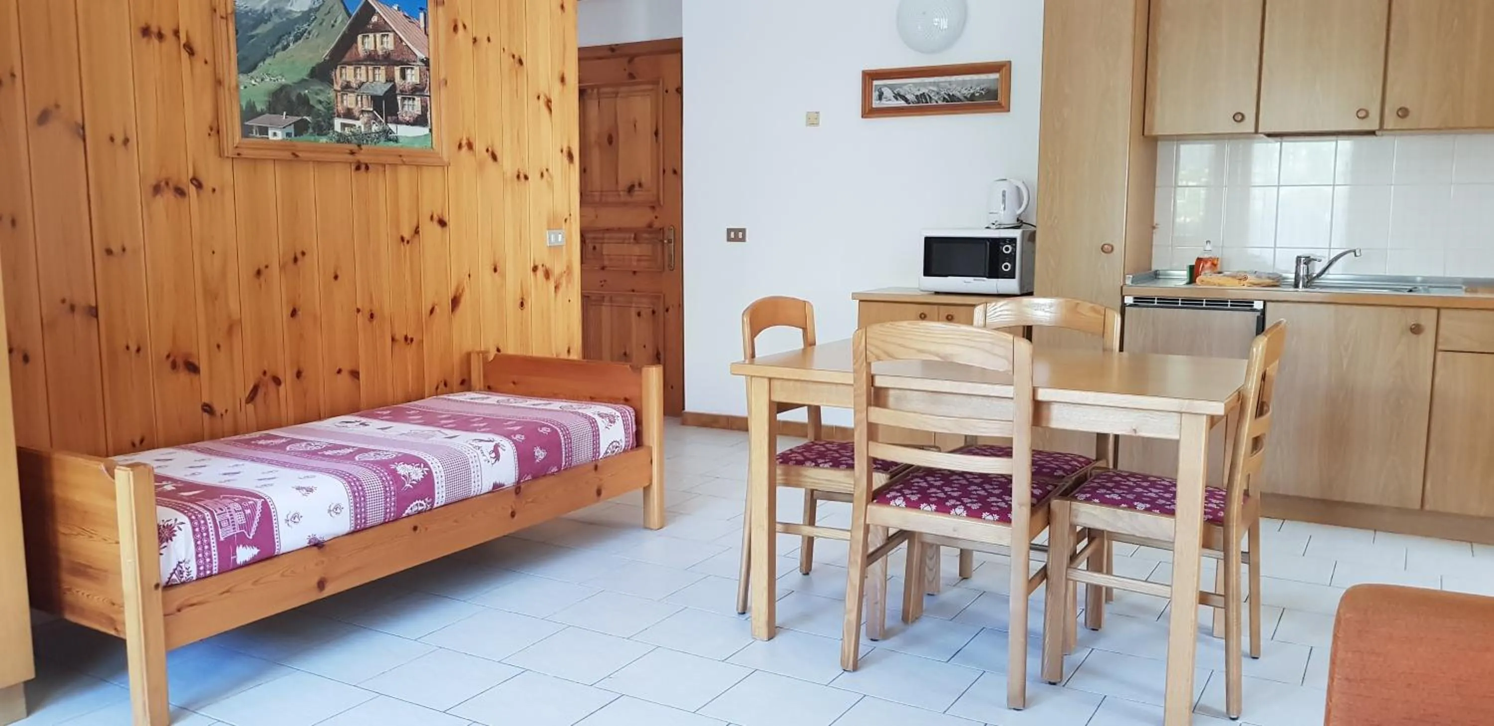 Living room, Bed in Baita al Pian