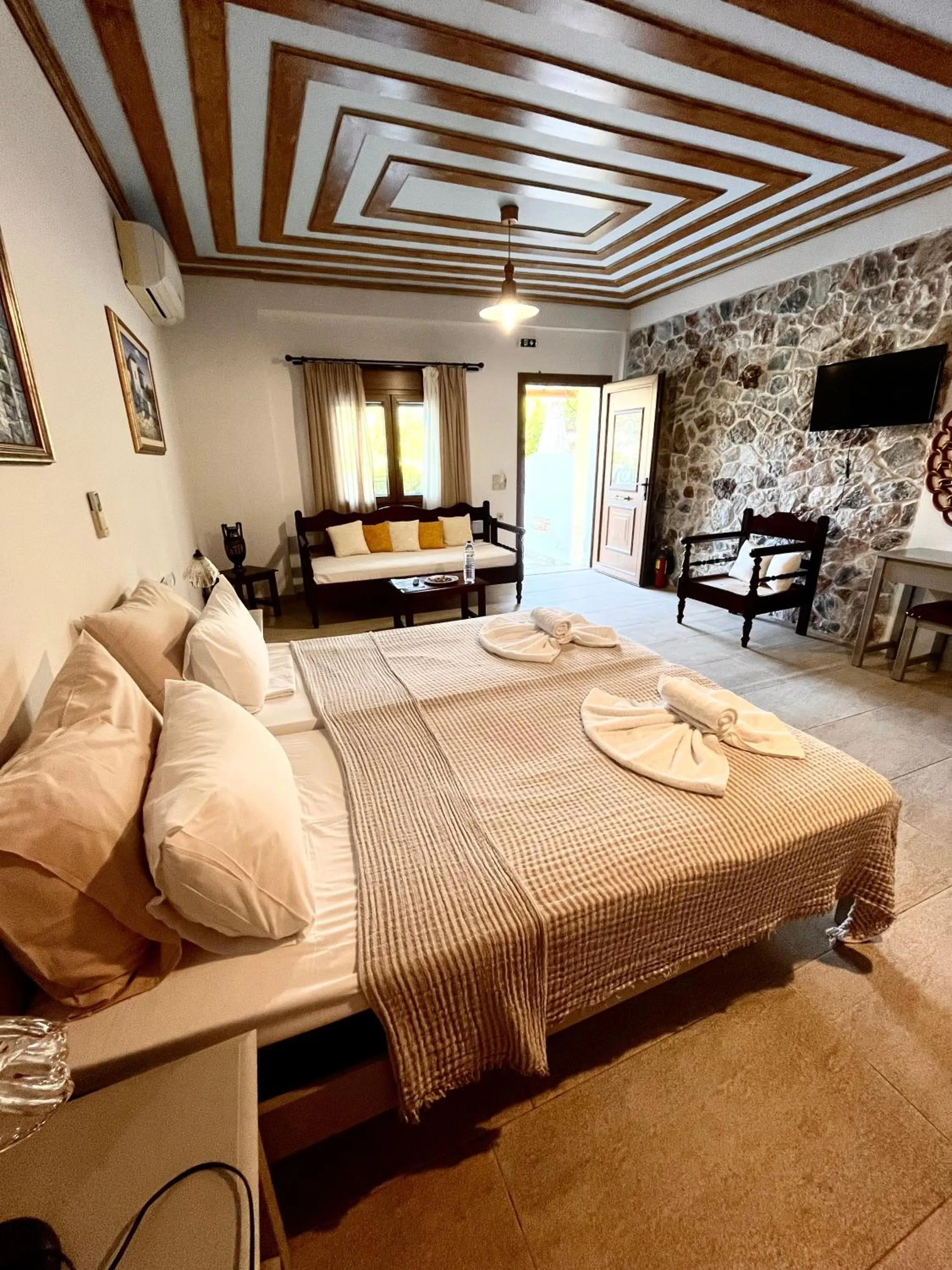 Bed in Pantheon Apartments & Studios