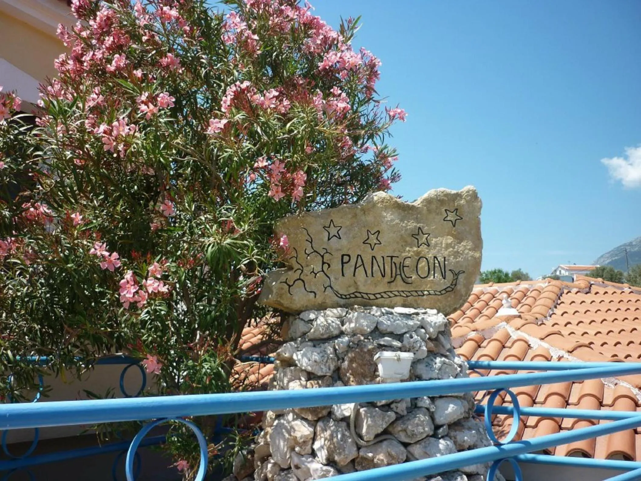 Logo/Certificate/Sign in Pantheon Apartments & Studios