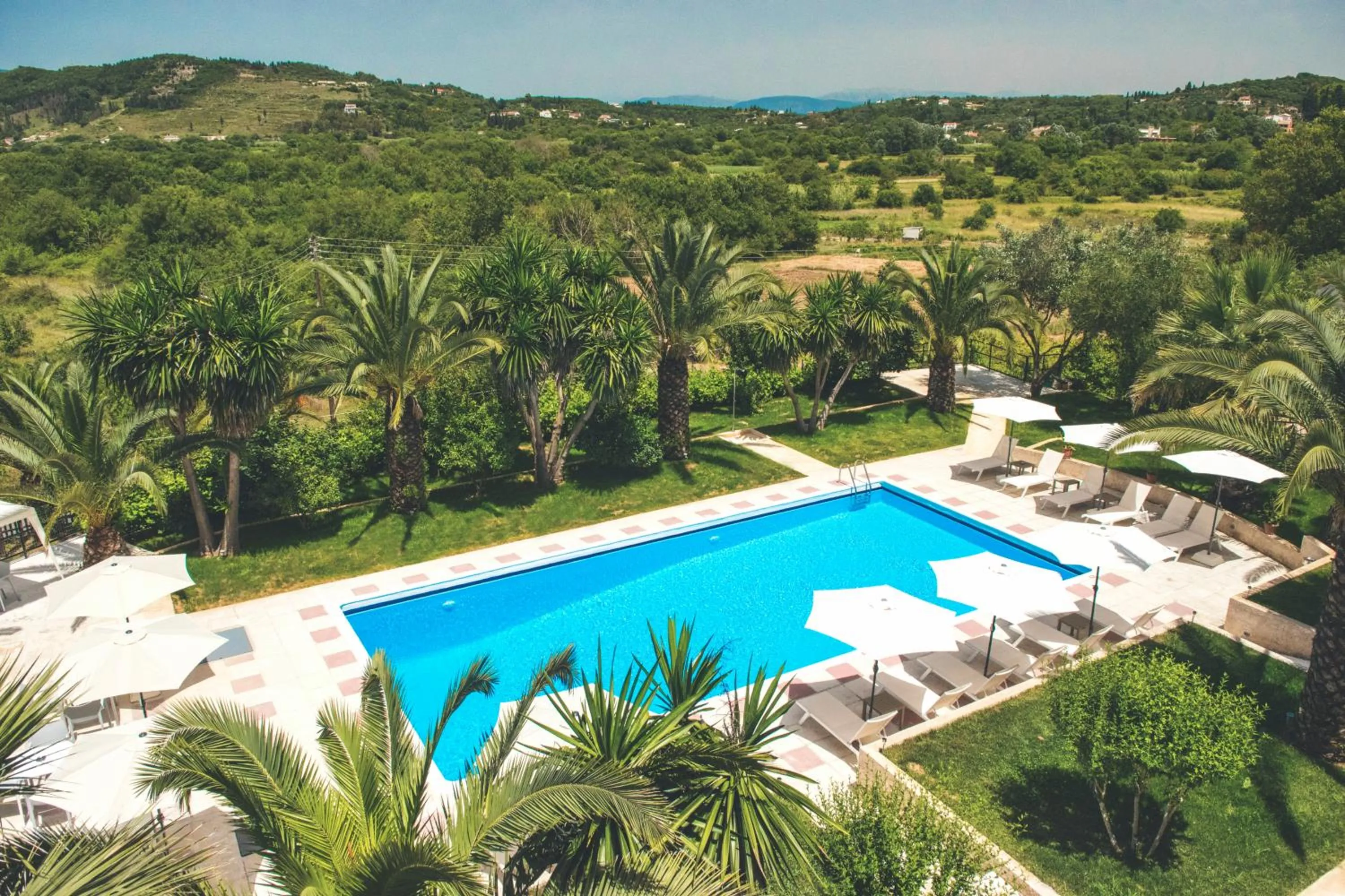 View (from property/room) in The Palm Garden - Idyllic Pool Apartments in a Green Oasis