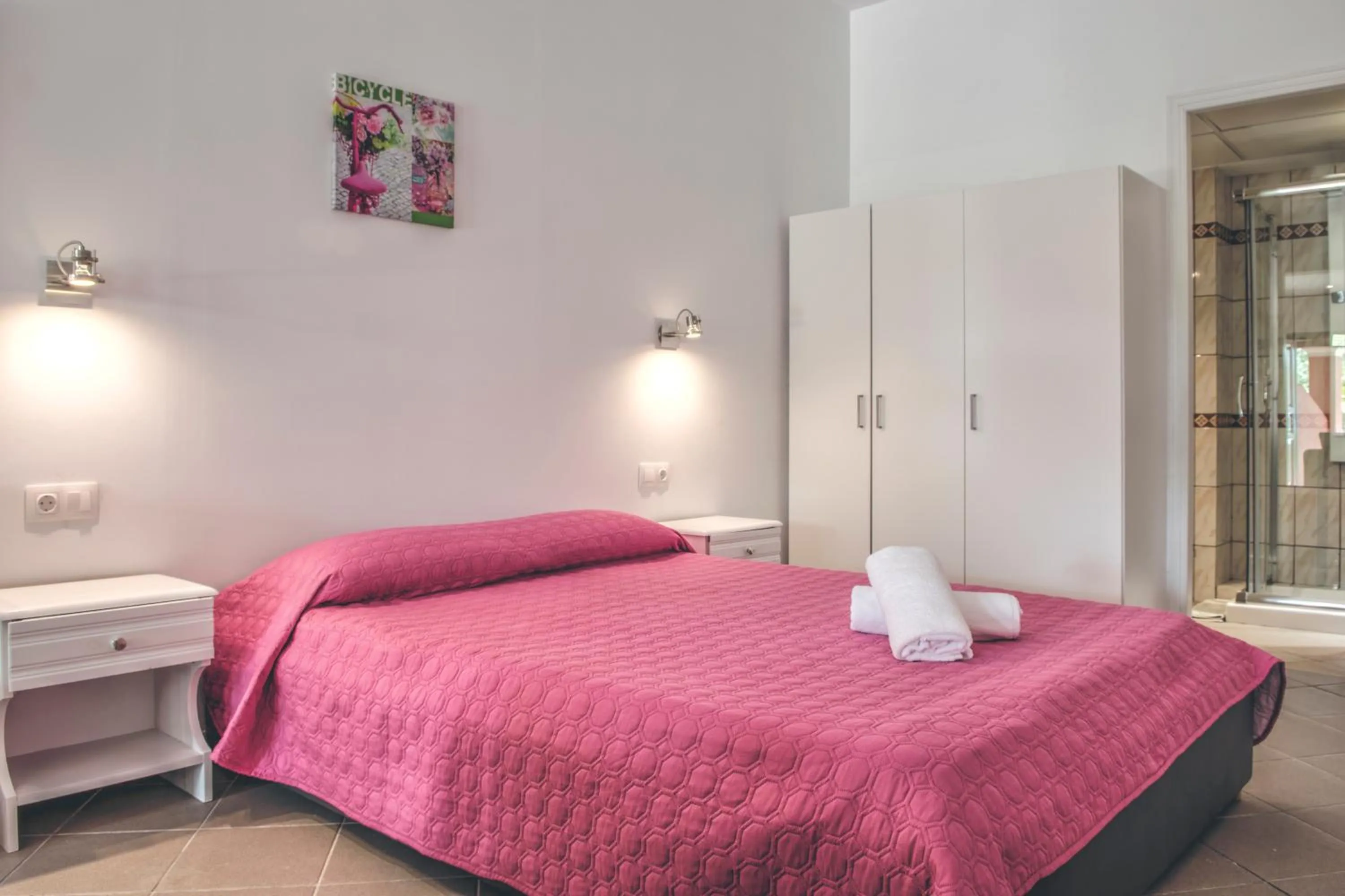 Bed in The Palm Garden - Idyllic Pool Apartments in a Green Oasis