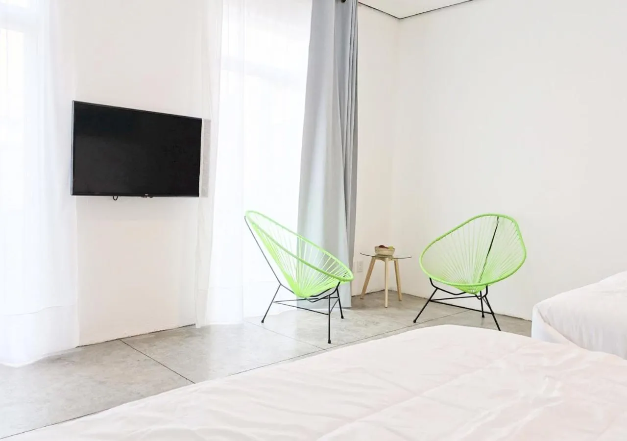 TV and multimedia, Bed in Hotel Mamá Carlota